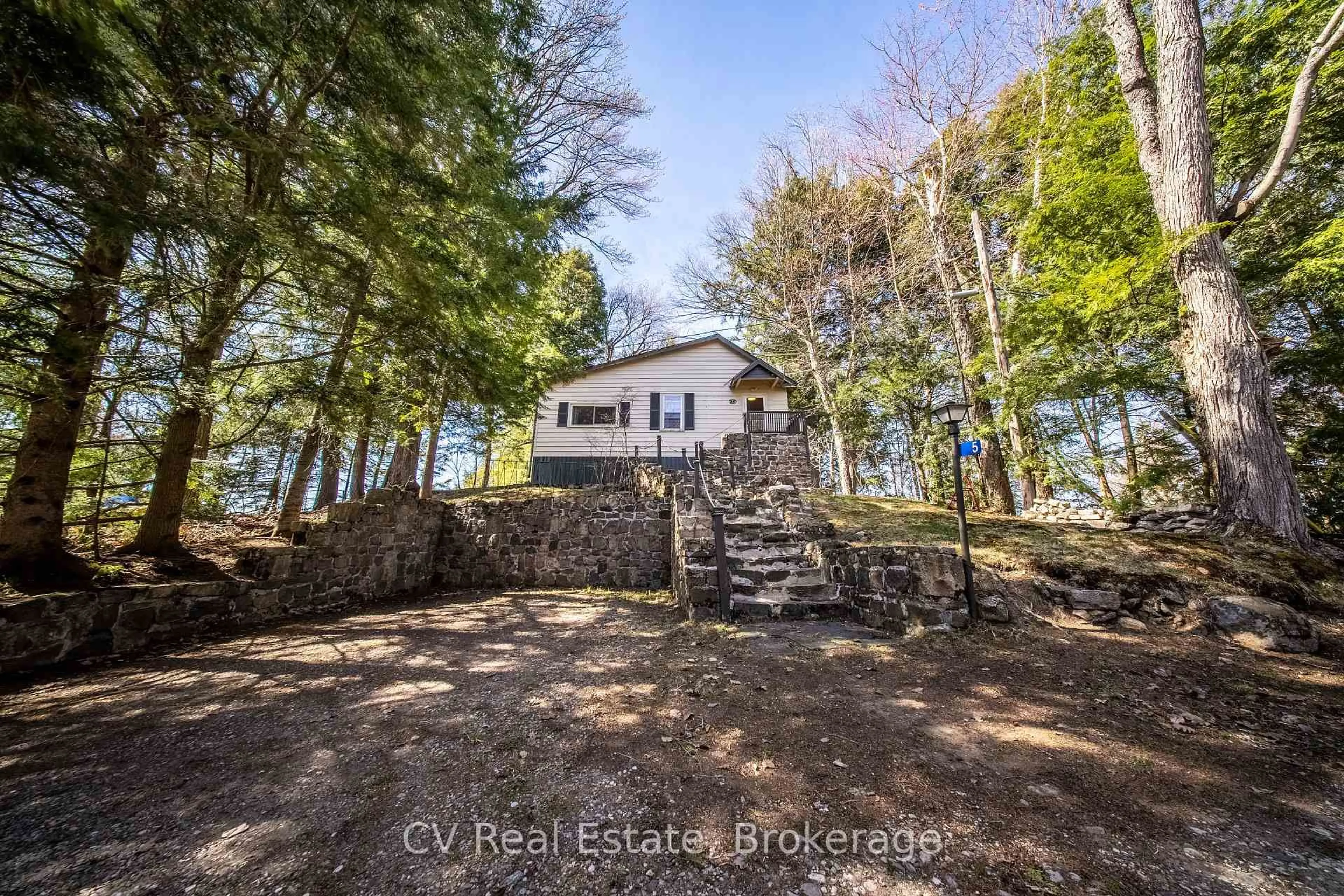 A pic from outside/outdoor area/front of a property/back of a property/a pic from drone, water/lake/river/ocean view for 1117 - Bert Sims Rd #Unit #5, Muskoka Lakes Ontario P0B 1M0