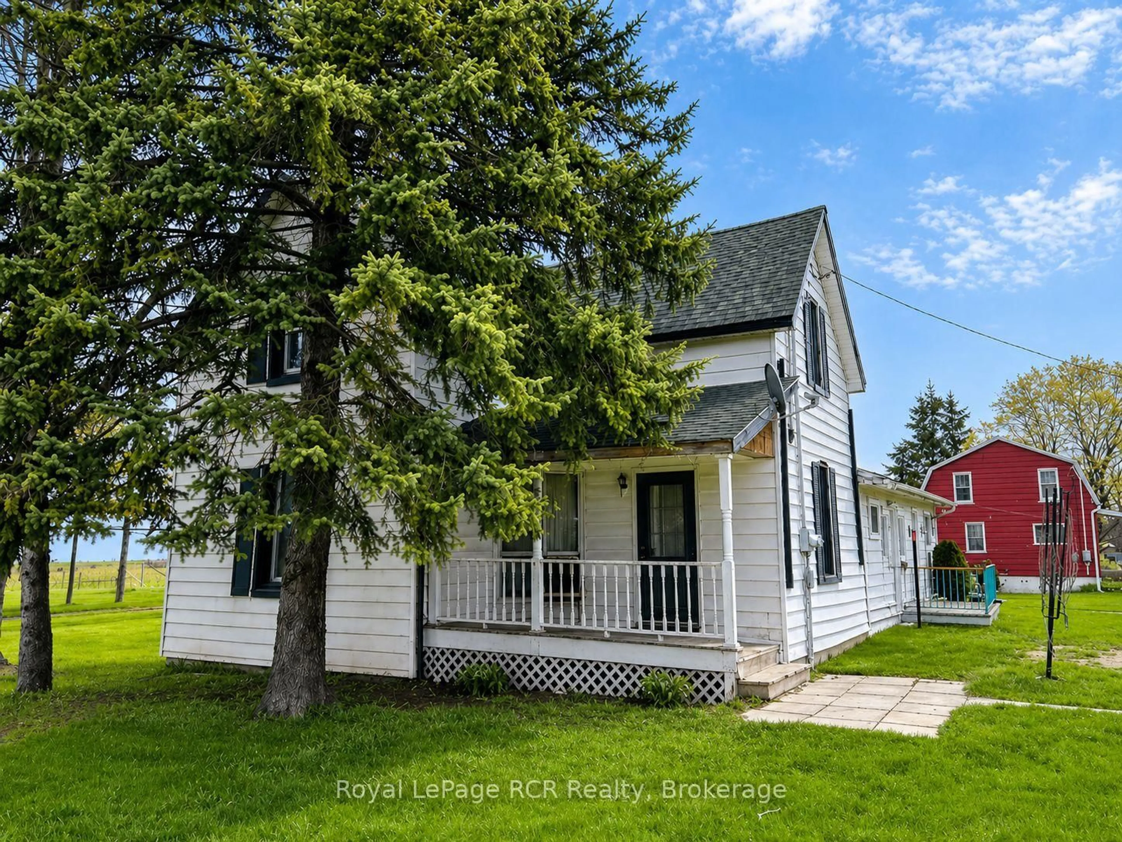 Home with vinyl exterior material, street for 116 Monument Rd, North Perth Ontario N0G 1B0