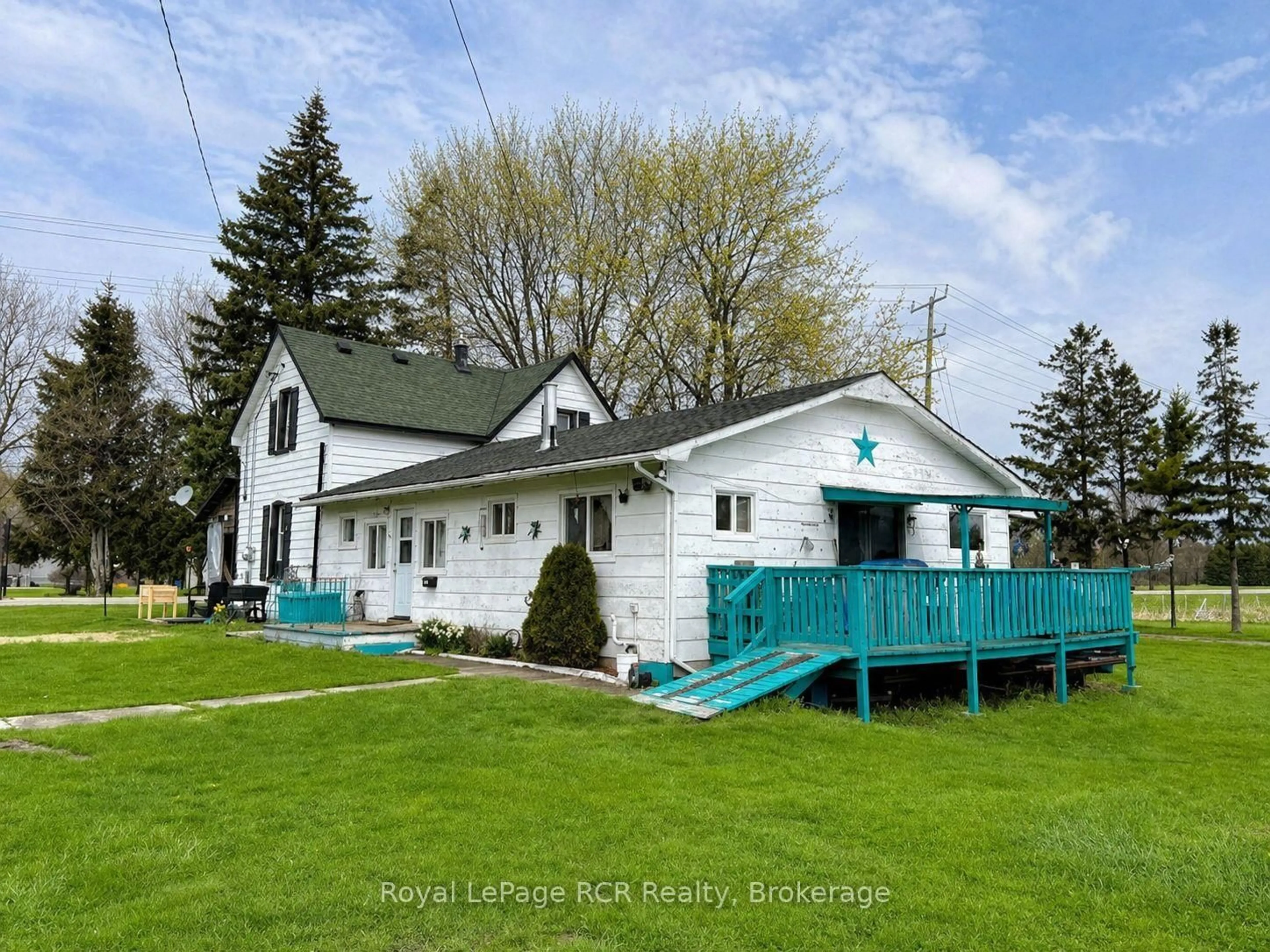 A pic from outside/outdoor area/front of a property/back of a property/a pic from drone, street for 116 Monument Rd, North Perth Ontario N0G 1B0