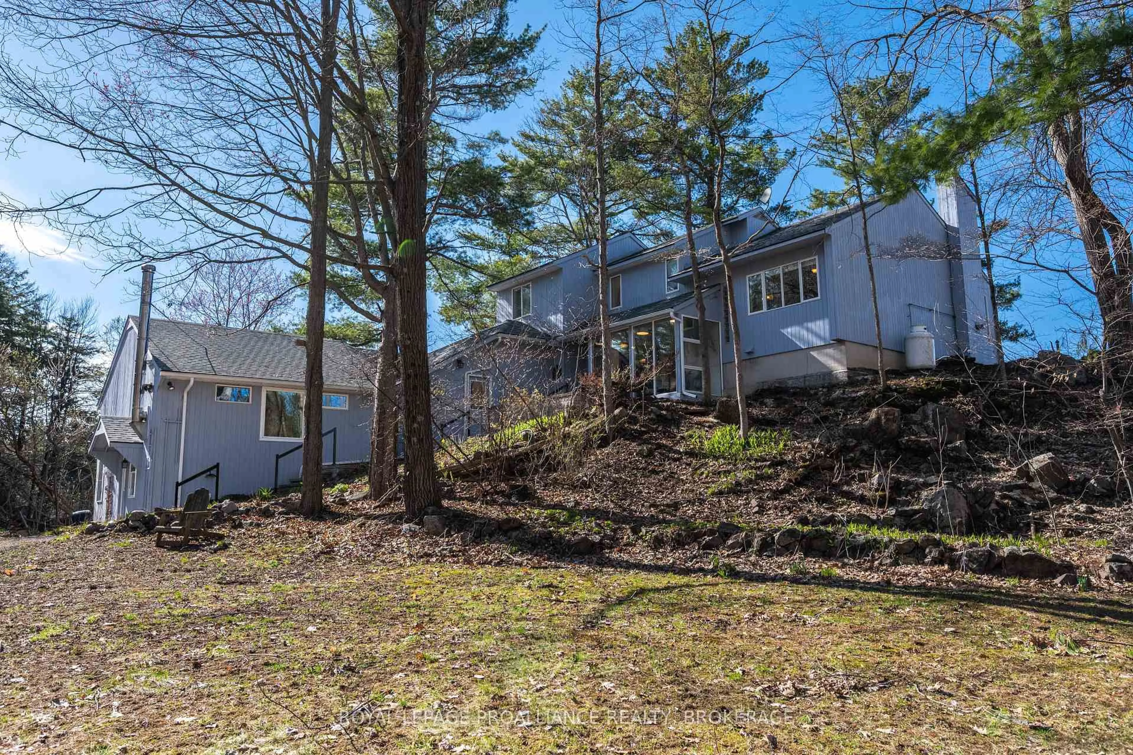 A pic from outside/outdoor area/front of a property/back of a property/a pic from drone, forest/trees view for 3860 Desert Lake Rd, Verona Ontario K0H 2W0