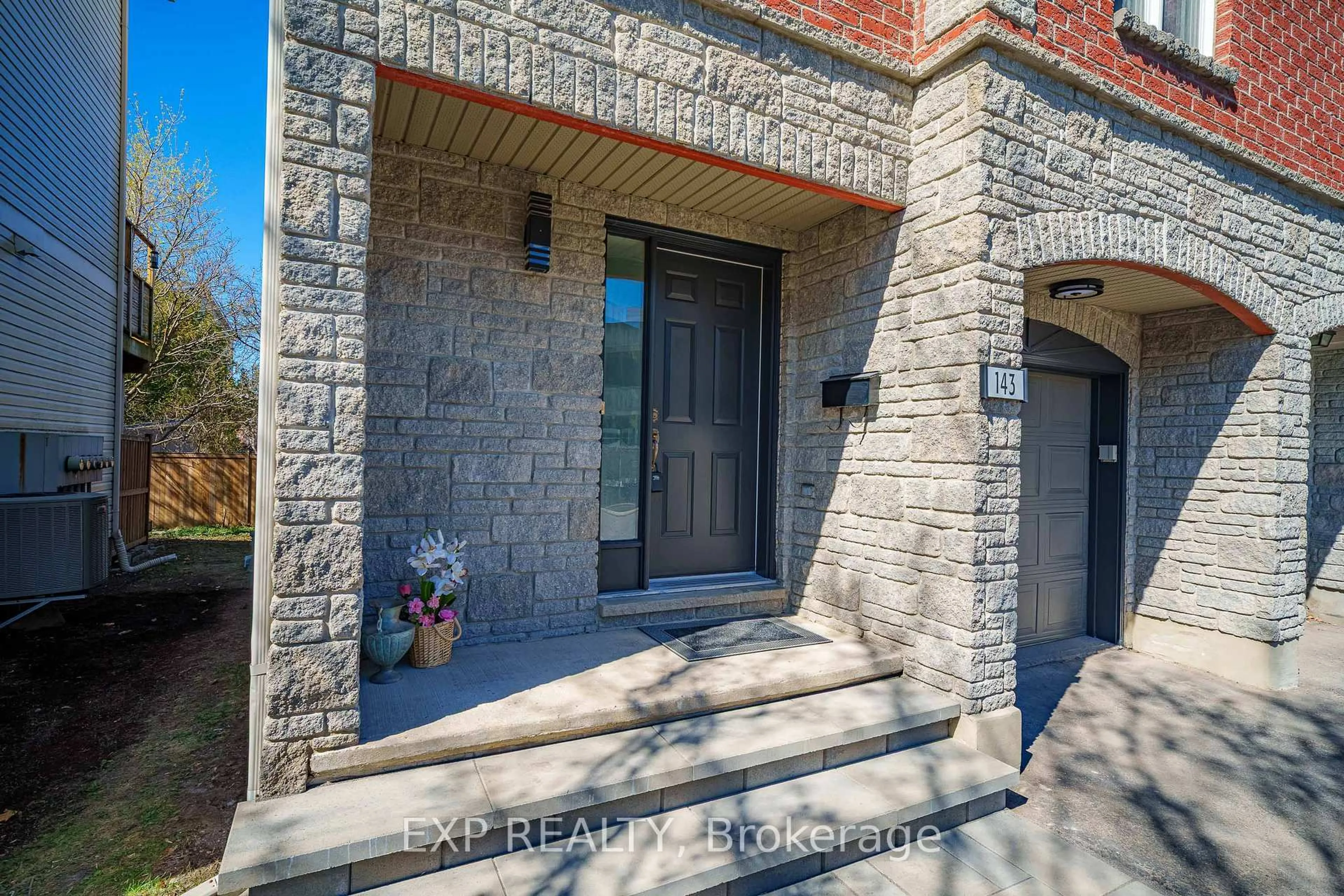 Home with brick exterior material, street for 143 Arcola Private, Ottawa Ontario K1K 4W9