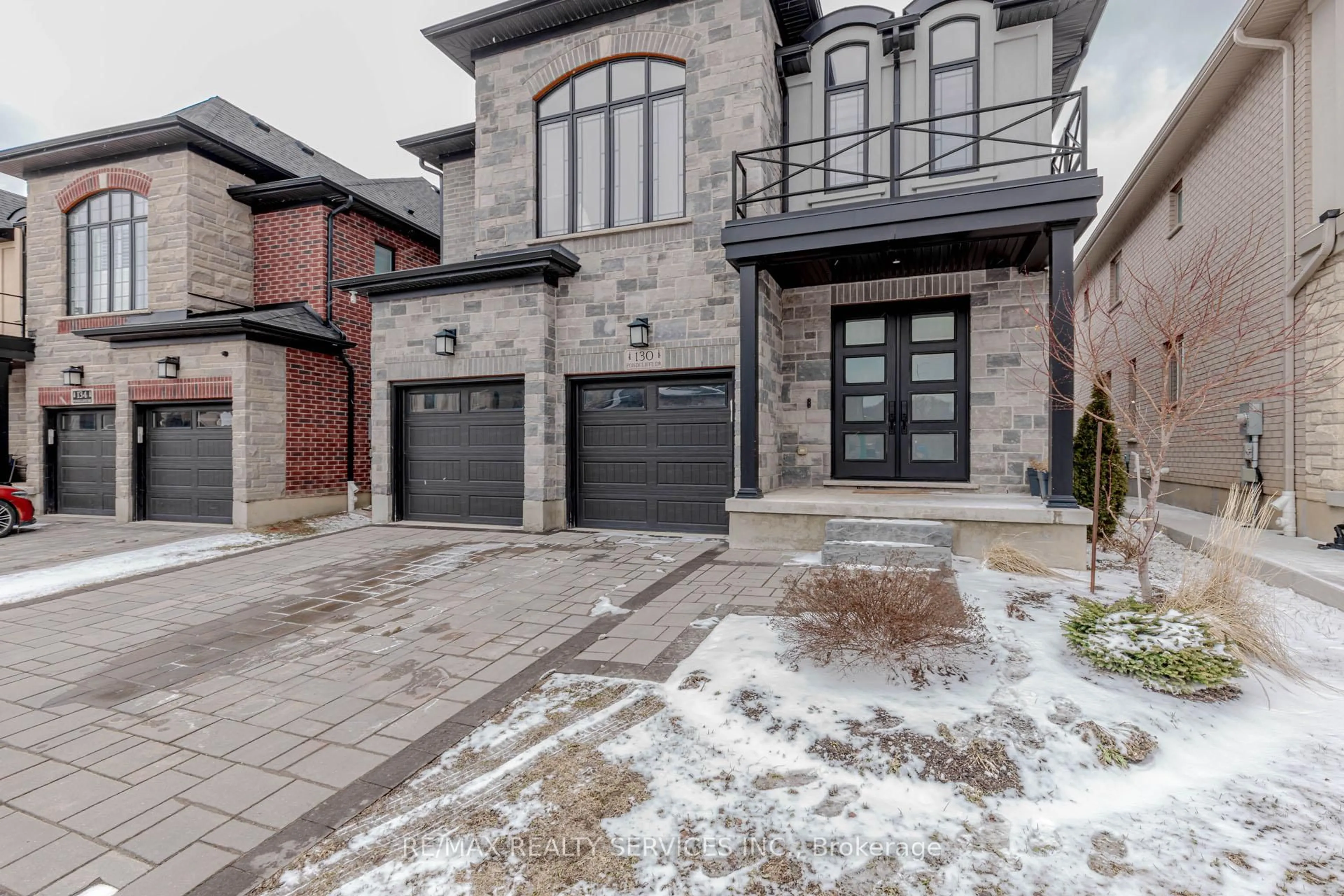 Home with brick exterior material, street for 130 Pondcliffe Dr, Kitchener Ontario N2R 0M4