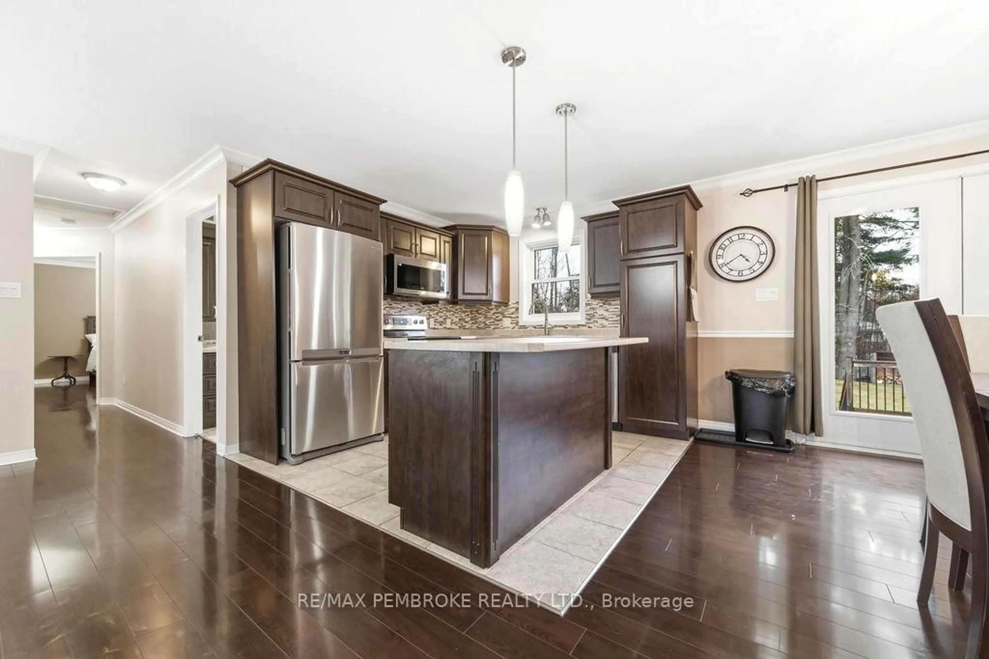 Open concept kitchen, wood/laminate floor for 610 Hummingbird Lane, Petawawa Ontario K8H 0A8