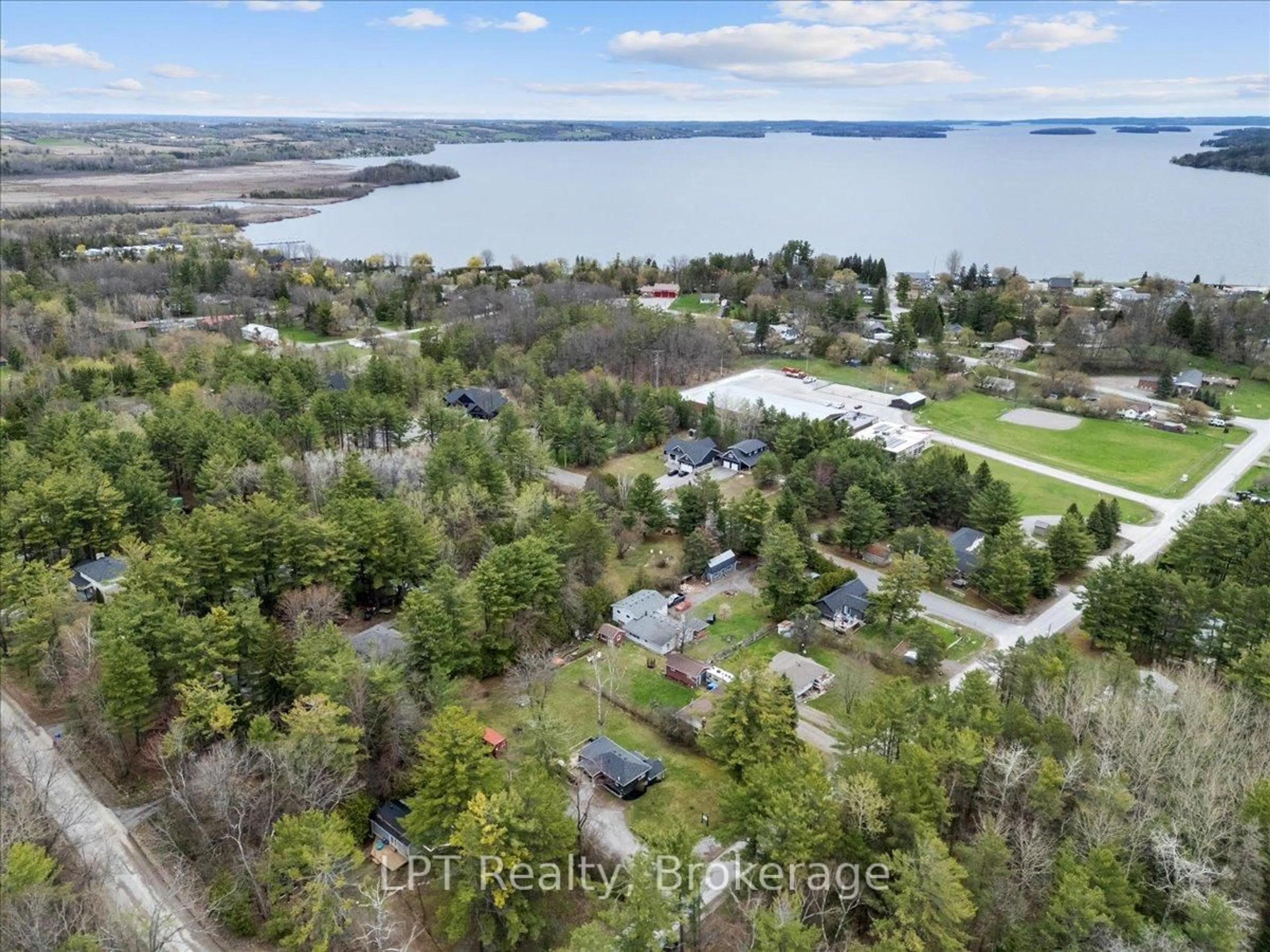 A pic from outside/outdoor area/front of a property/back of a property/a pic from drone, water/lake/river/ocean view for 7010 Lake St, Hamilton Township Ontario K0L 1E0