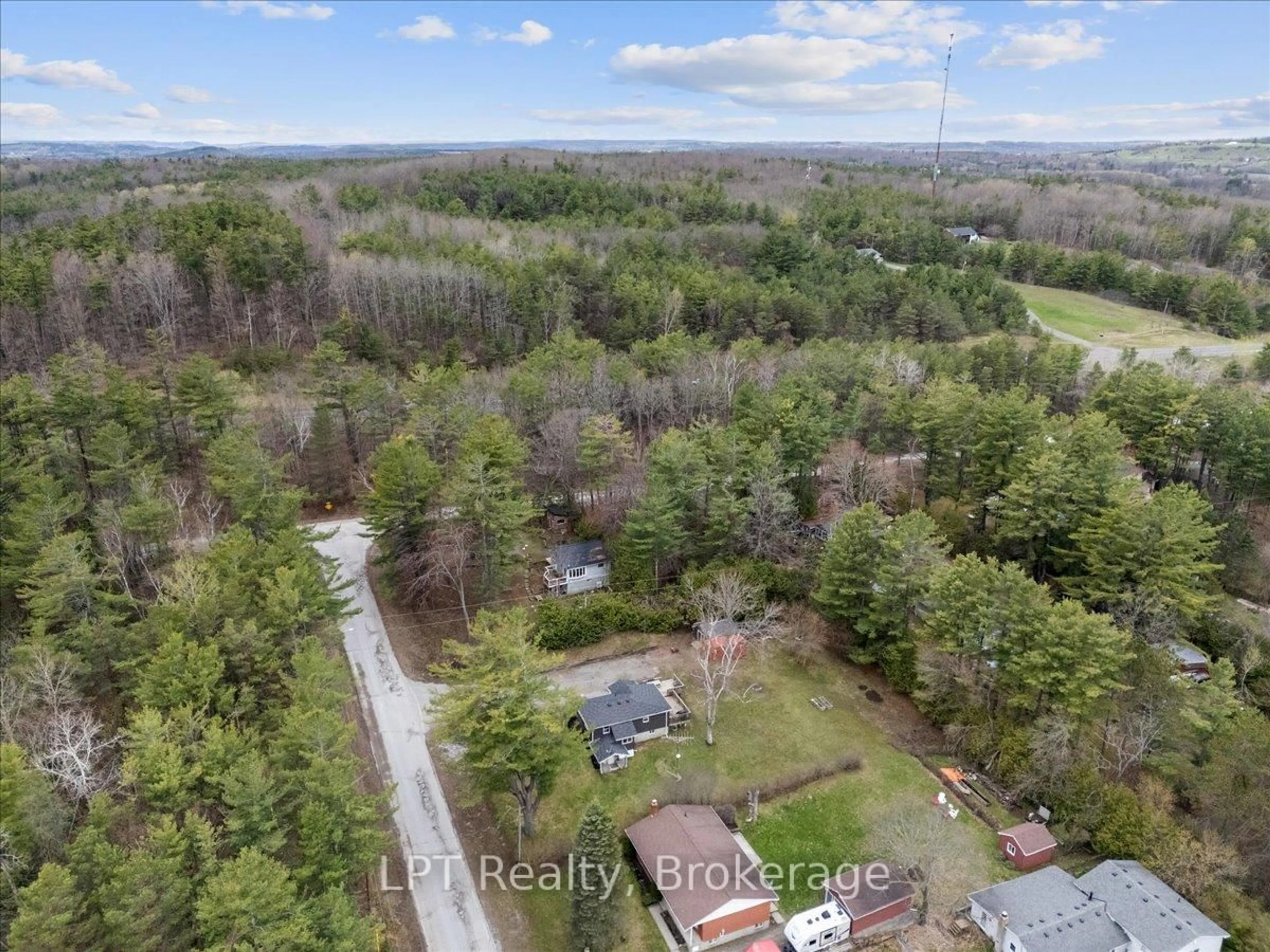 A pic from outside/outdoor area/front of a property/back of a property/a pic from drone, forest/trees view for 7010 Lake St, Hamilton Township Ontario K0L 1E0