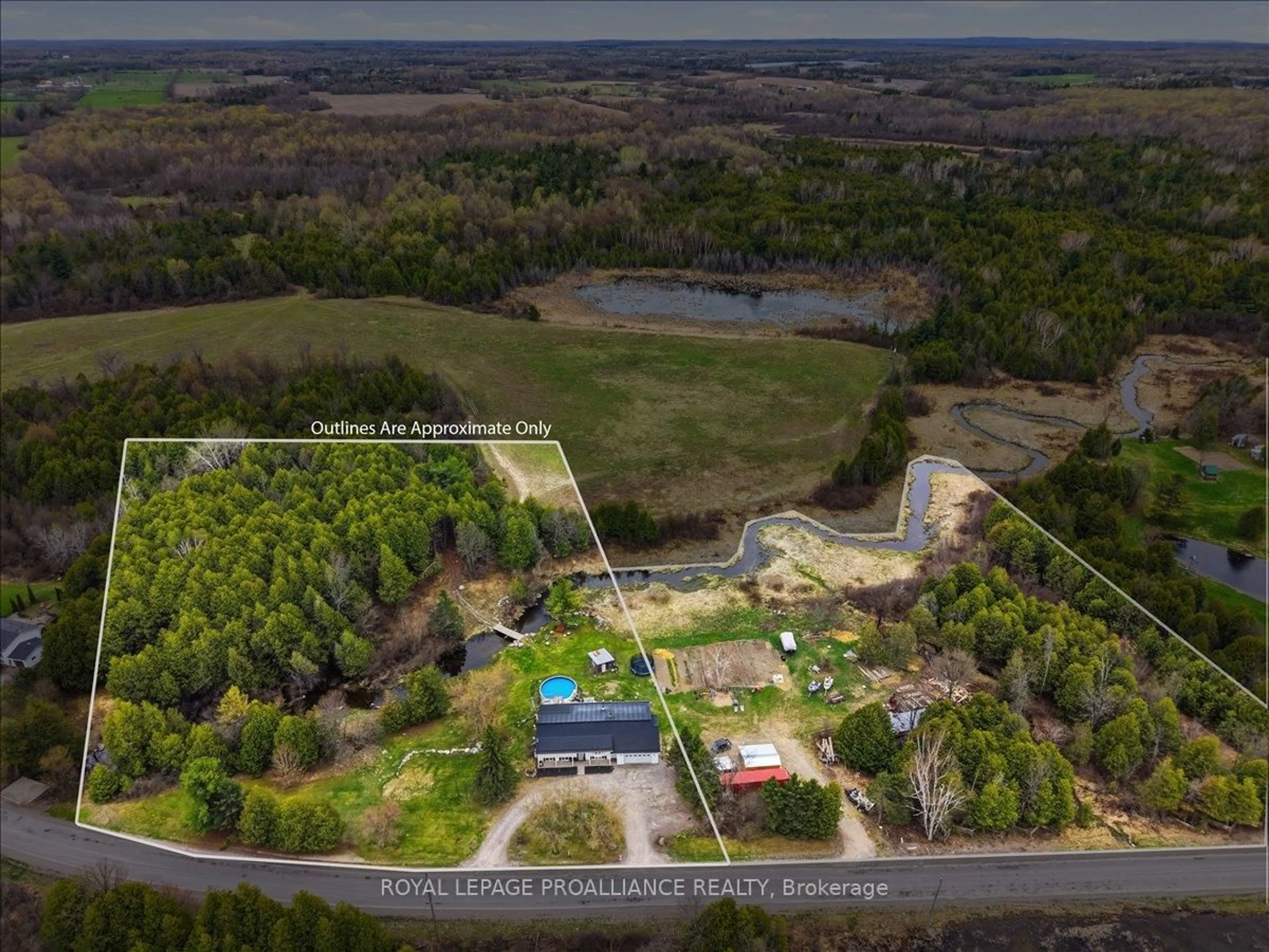 A pic from outside/outdoor area/front of a property/back of a property/a pic from drone, water/lake/river/ocean view for 1442 Quin Mo Lac Rd, Tweed Ontario K0K 3J0