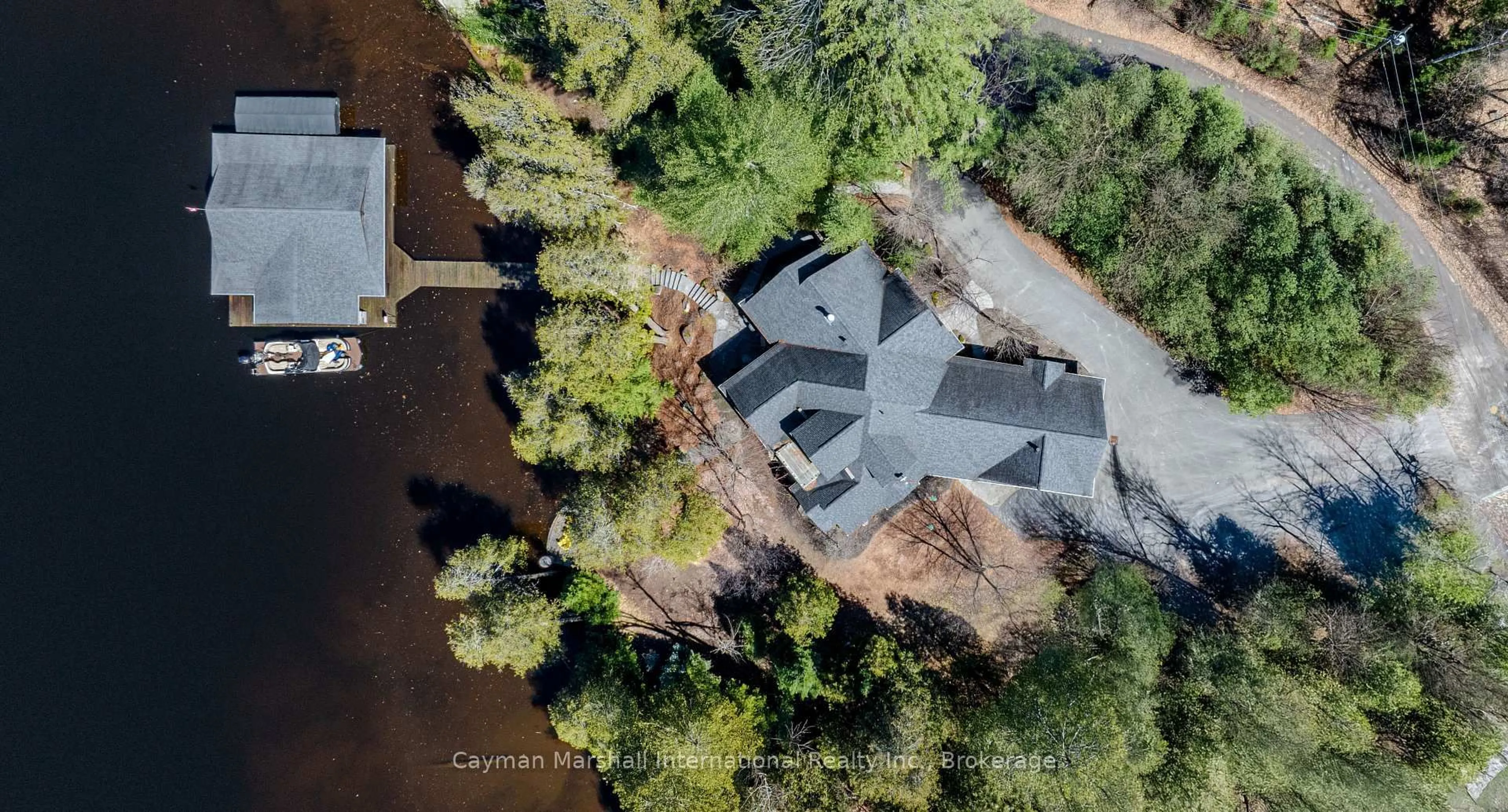 A pic from outside/outdoor area/front of a property/back of a property/a pic from drone, water/lake/river/ocean view for 120 Bay Meadows Rd, Huntsville Ontario P1H 1R4