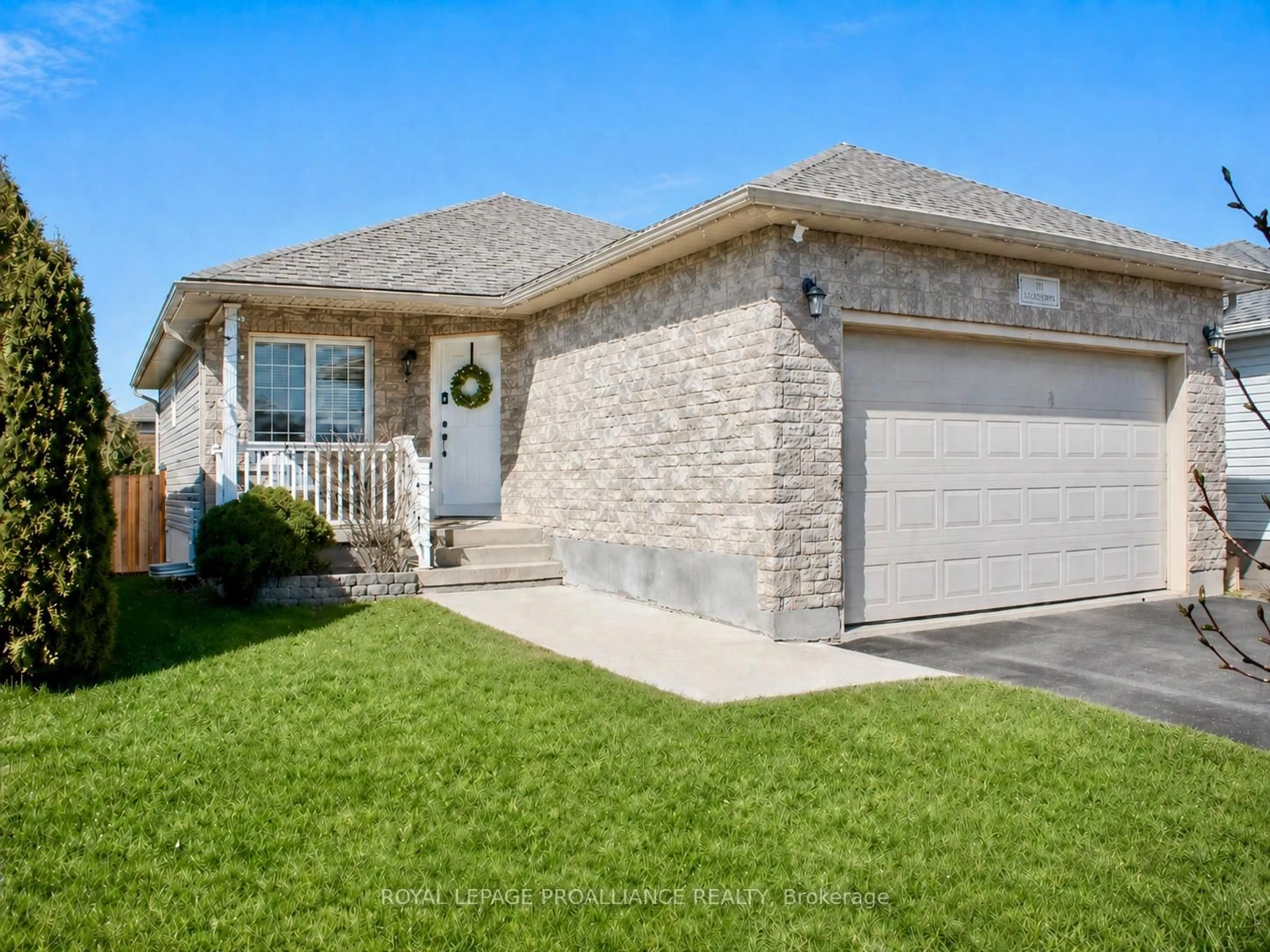 Home with brick exterior material, street for 111 Hogan Cres, Loyalist Ontario K7N 0A6