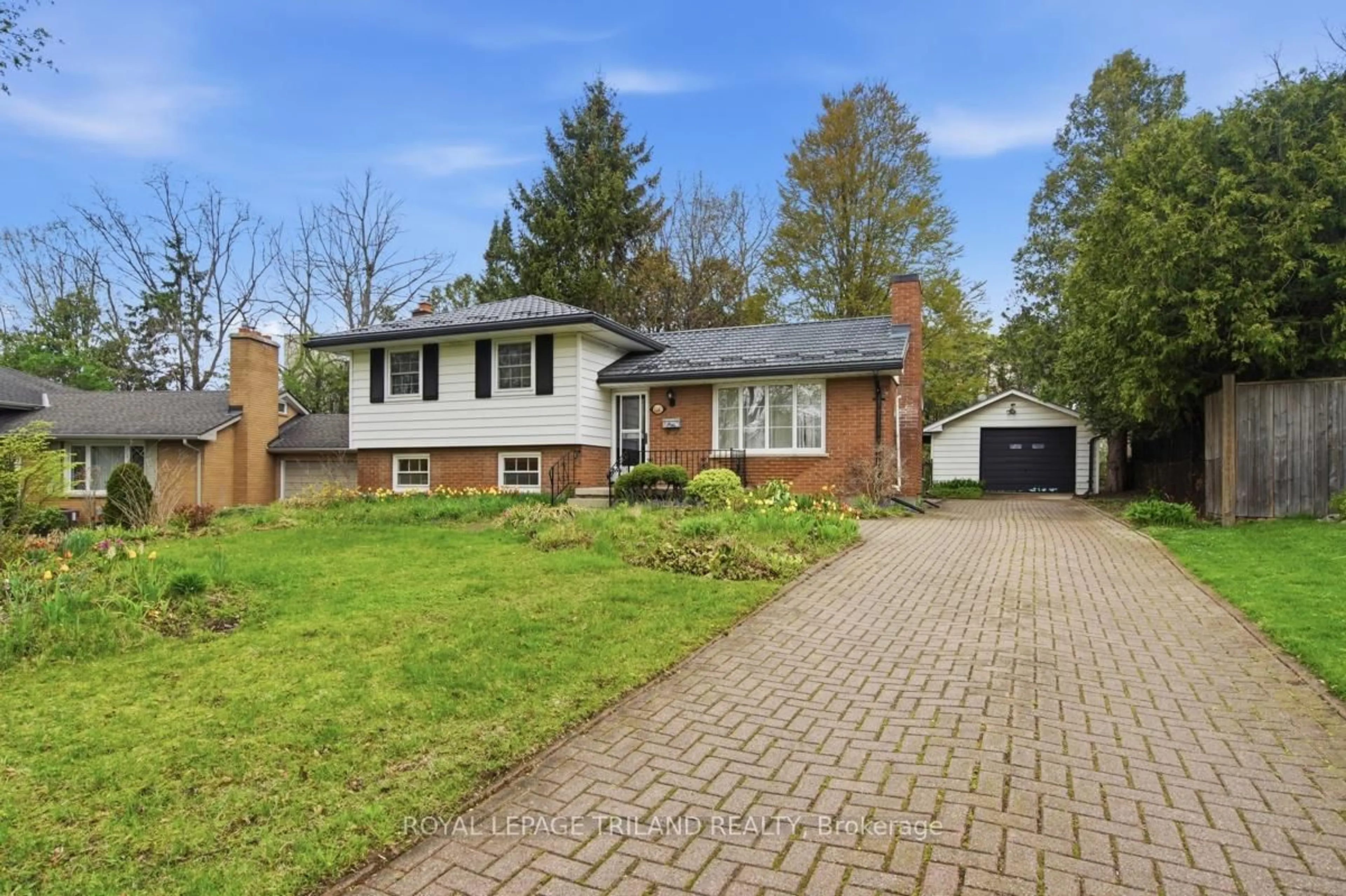 Home with brick exterior material, street for 1281 Victoria Dr, London East Ontario N5Y 4E5