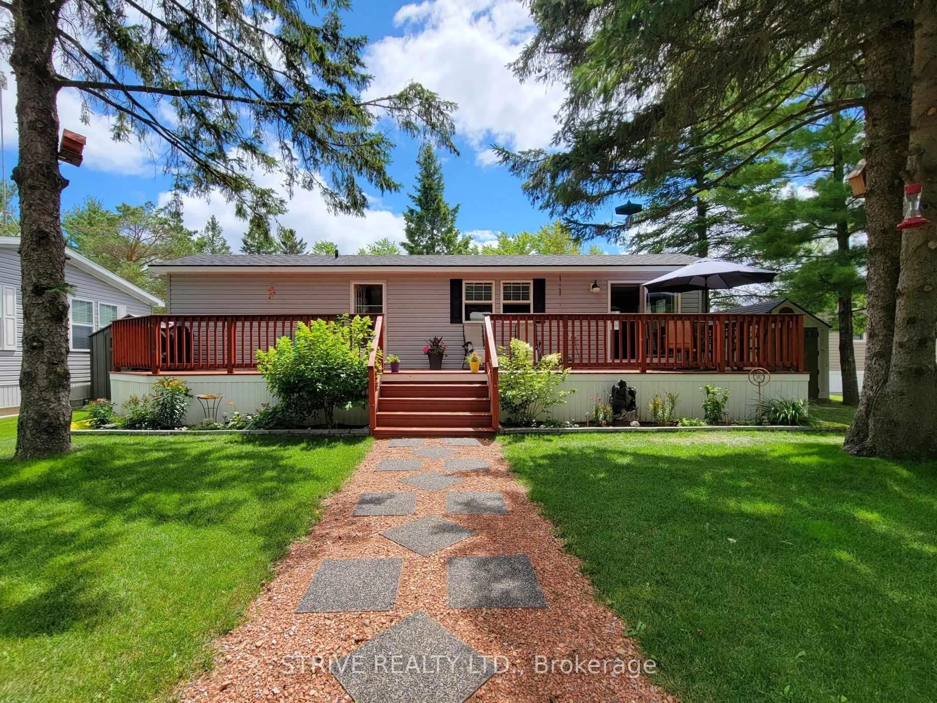 A pic from outside/outdoor area/front of a property/back of a property/a pic from drone, street for 3-2152 County Rd 36 Rd, Kawartha Lakes Ontario K0M 1L0