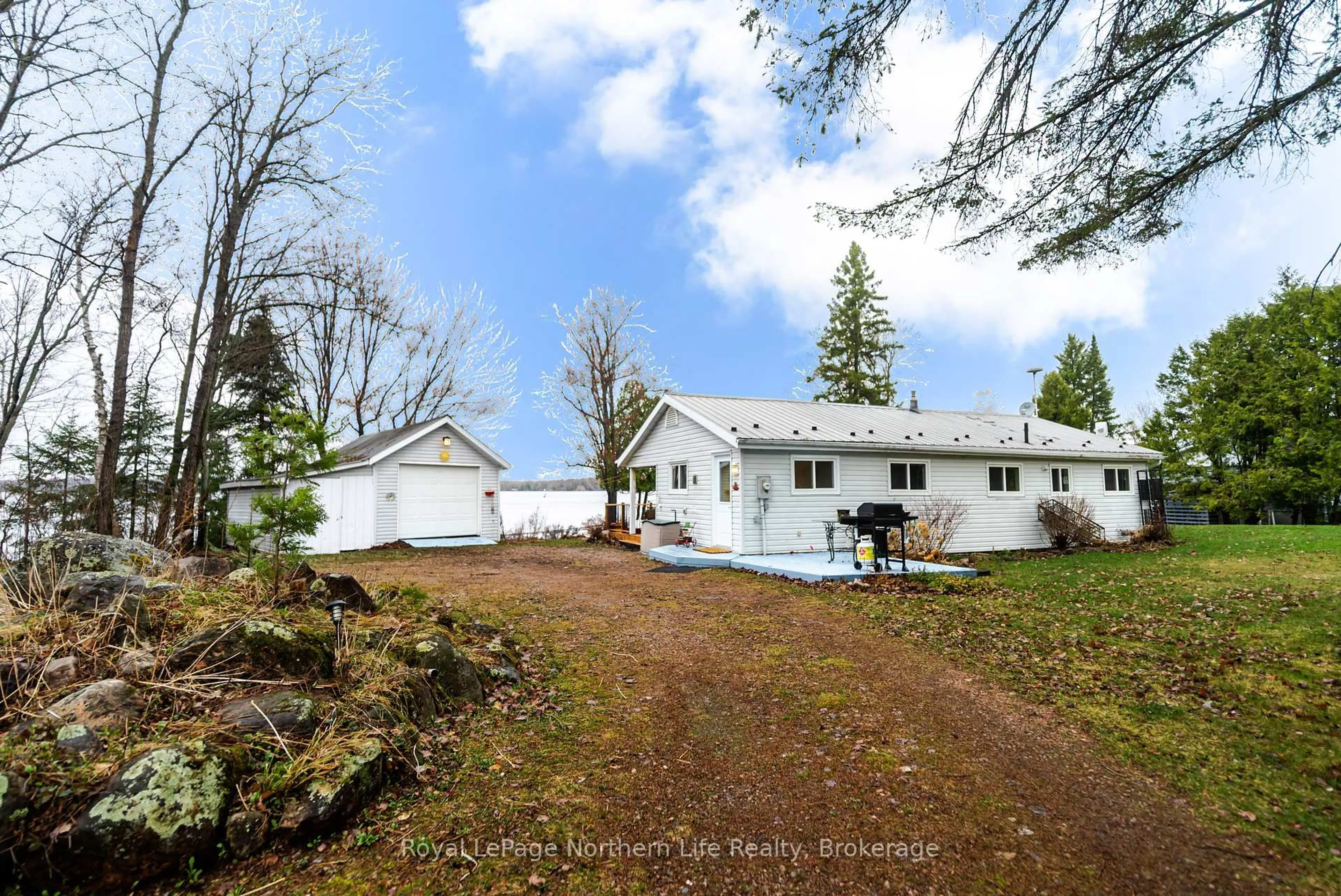 A pic from outside/outdoor area/front of a property/back of a property/a pic from drone, unknown for 80 Islandview Lane, Chisholm Ontario P0H 1Z0