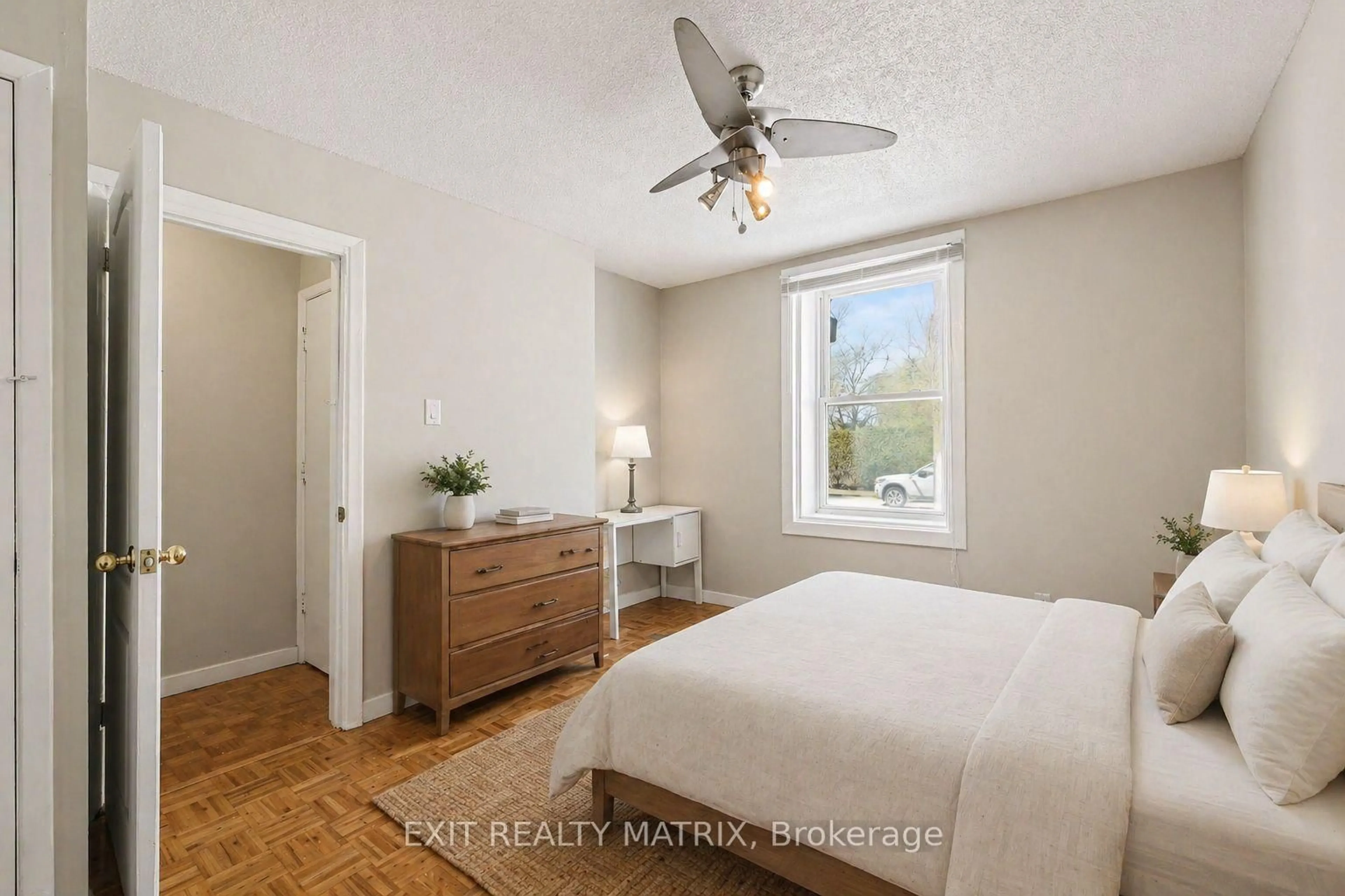 Bedroom with bed, wood/laminate floor for 70 Bolton St, Ottawa Ontario K1N 5A9