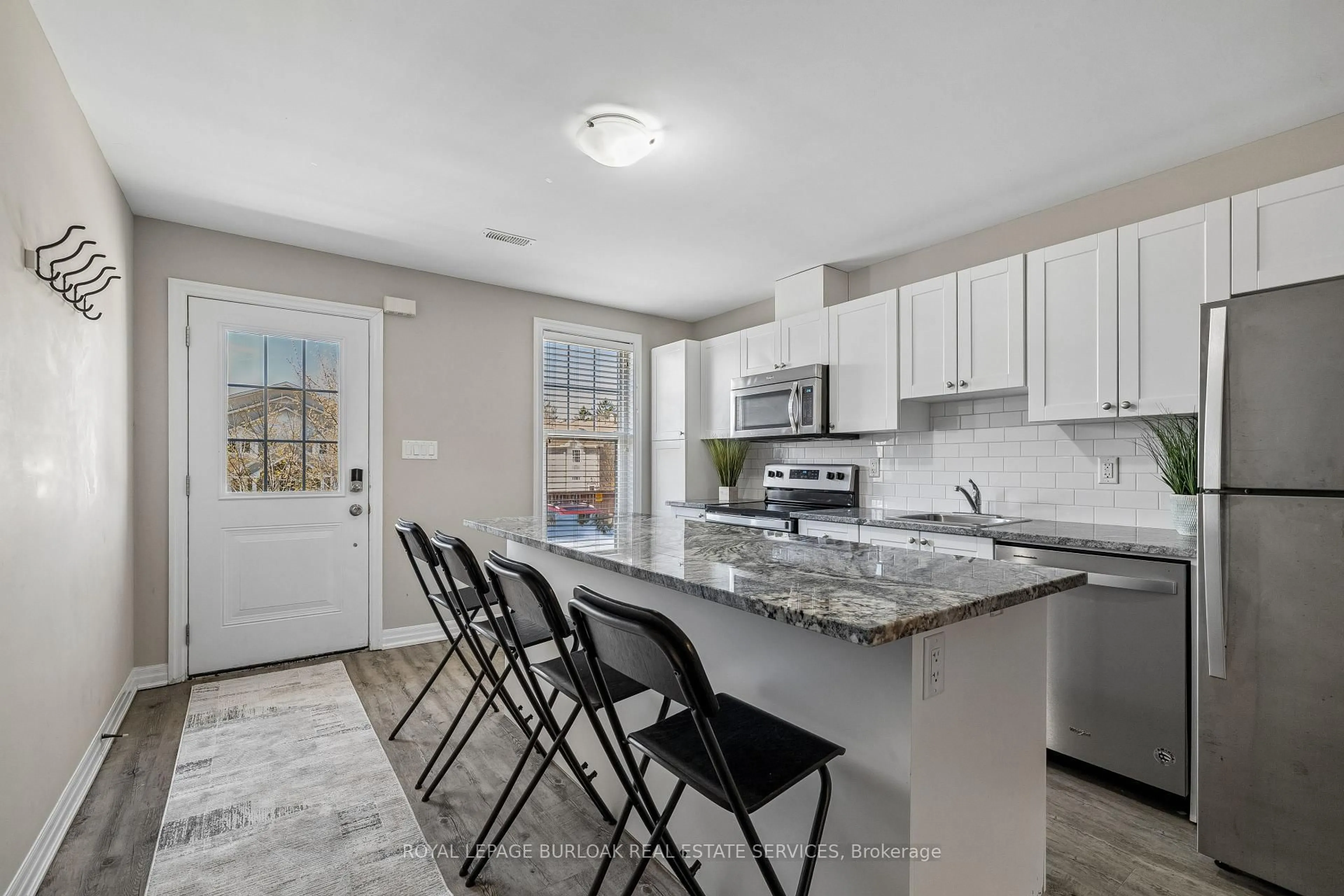 Open concept kitchen, ceramic/tile floor for 807 Gordon St #7, Guelph Ontario N1G 1Y8