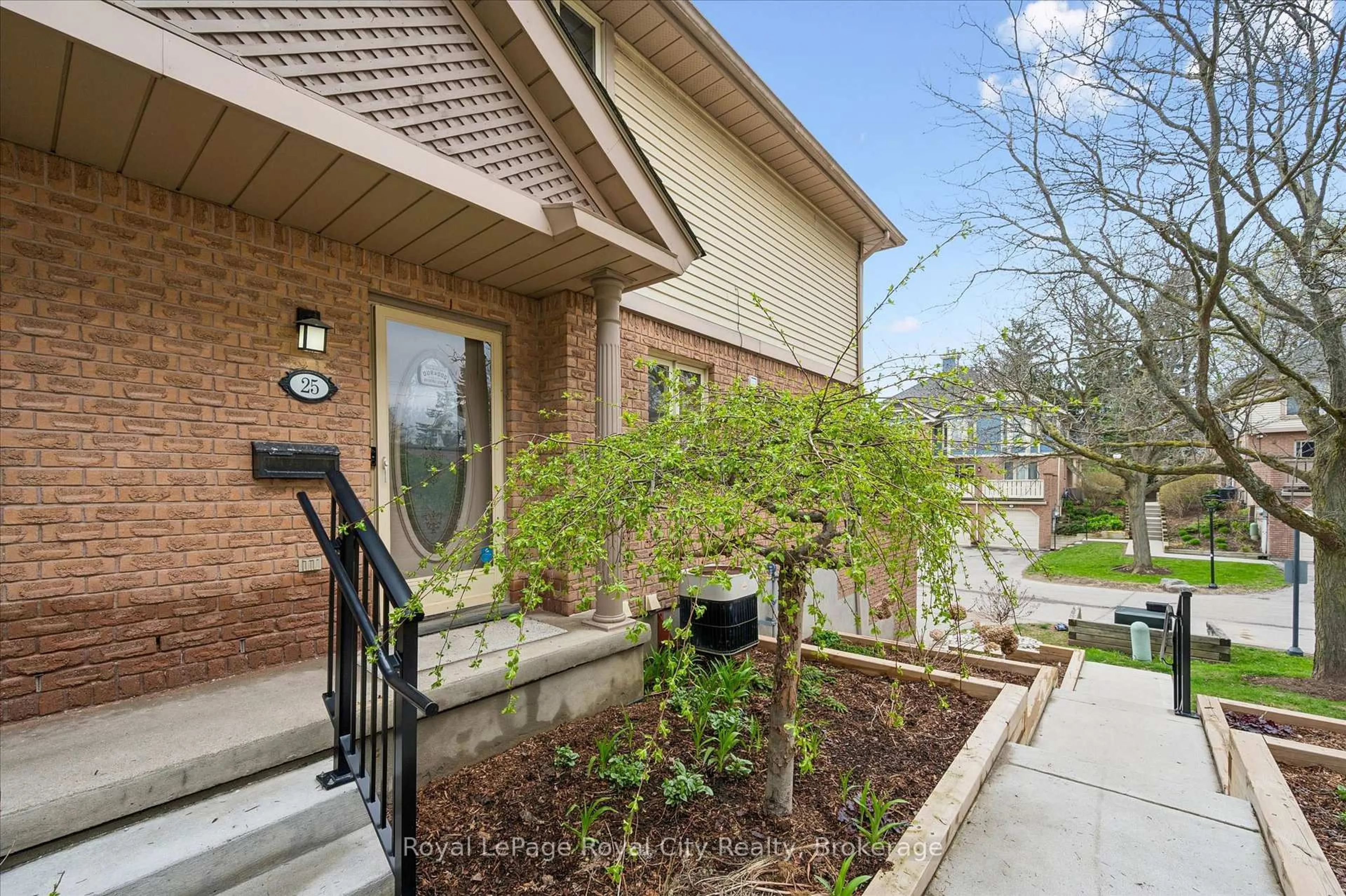 Home with brick exterior material, street for 941 Gordon St #25, Guelph Ontario N1G 4R9