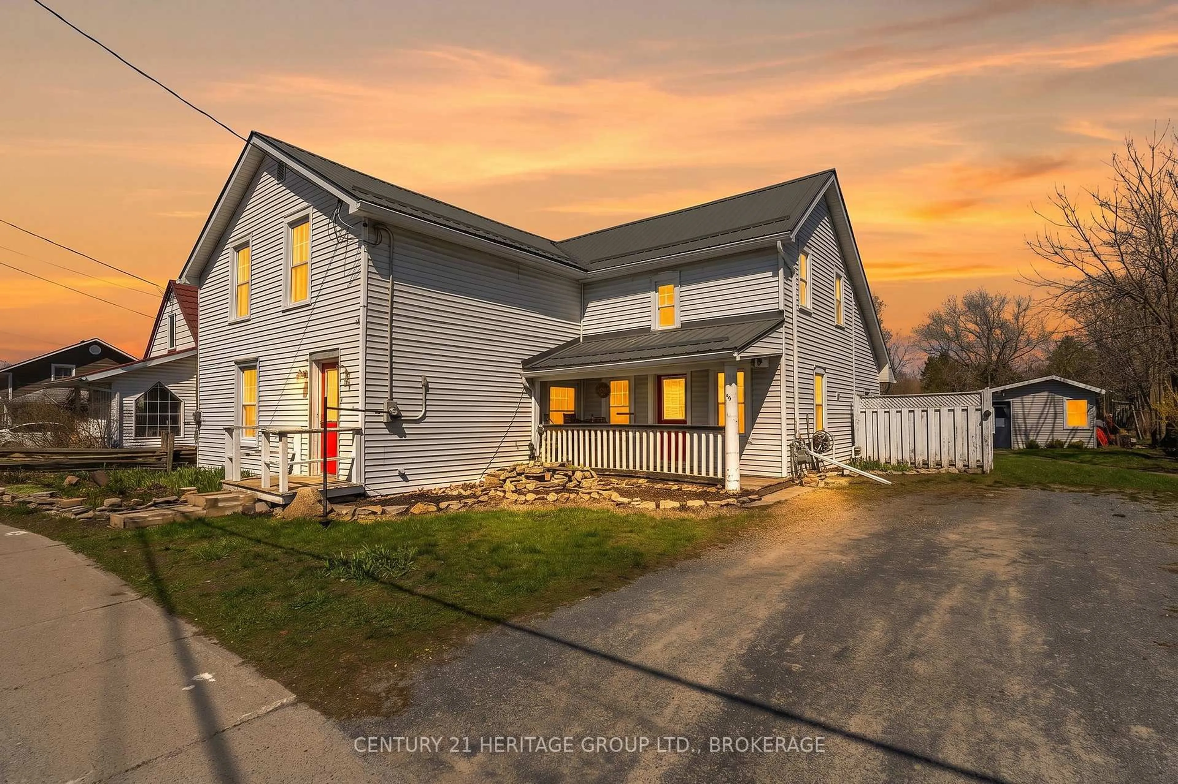 A pic from outside/outdoor area/front of a property/back of a property/a pic from drone, street for 70 Main St, Bissett Creek Ontario K0H 2H0
