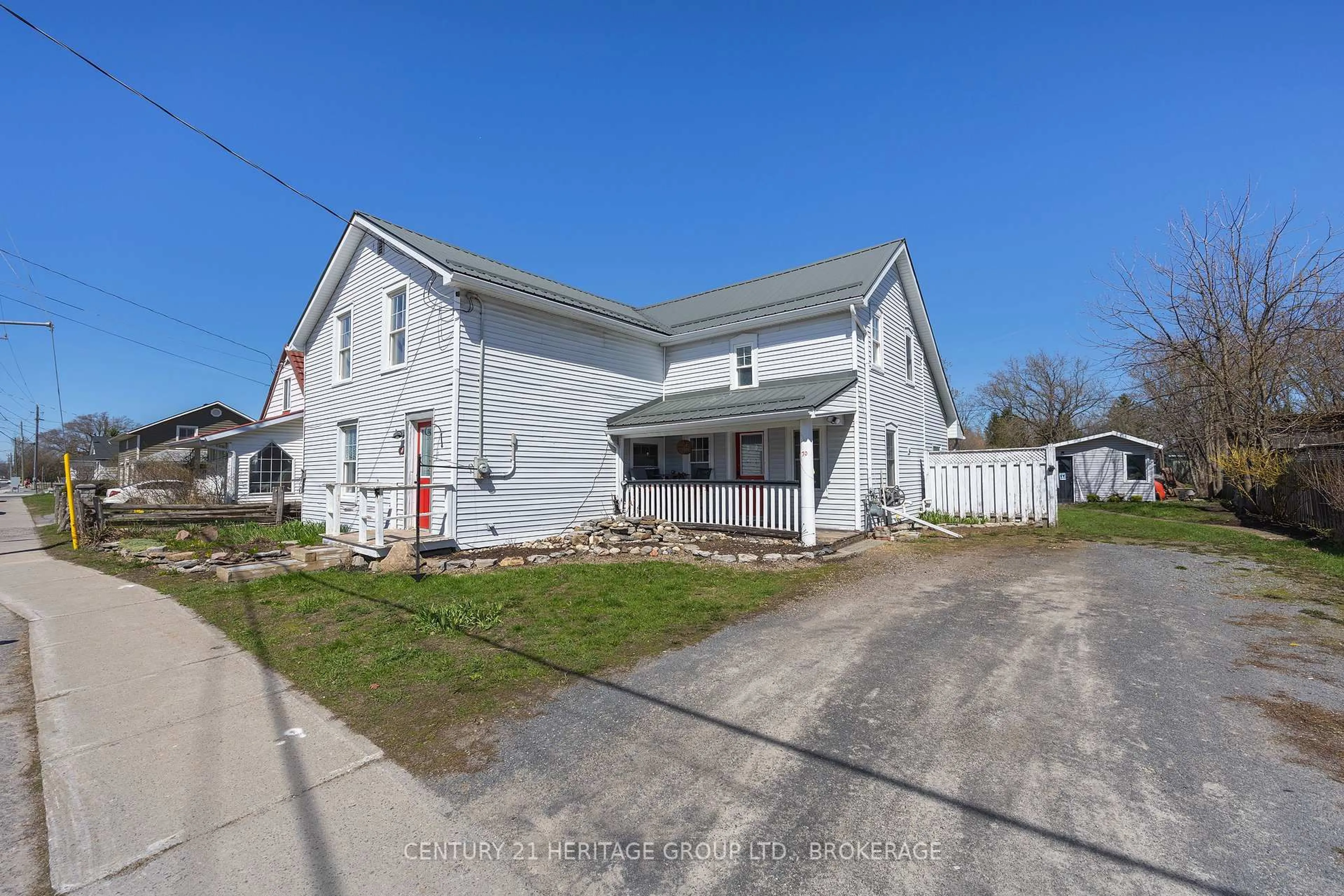A pic from outside/outdoor area/front of a property/back of a property/a pic from drone, building for 70 Main St, Bissett Creek Ontario K0H 2H0