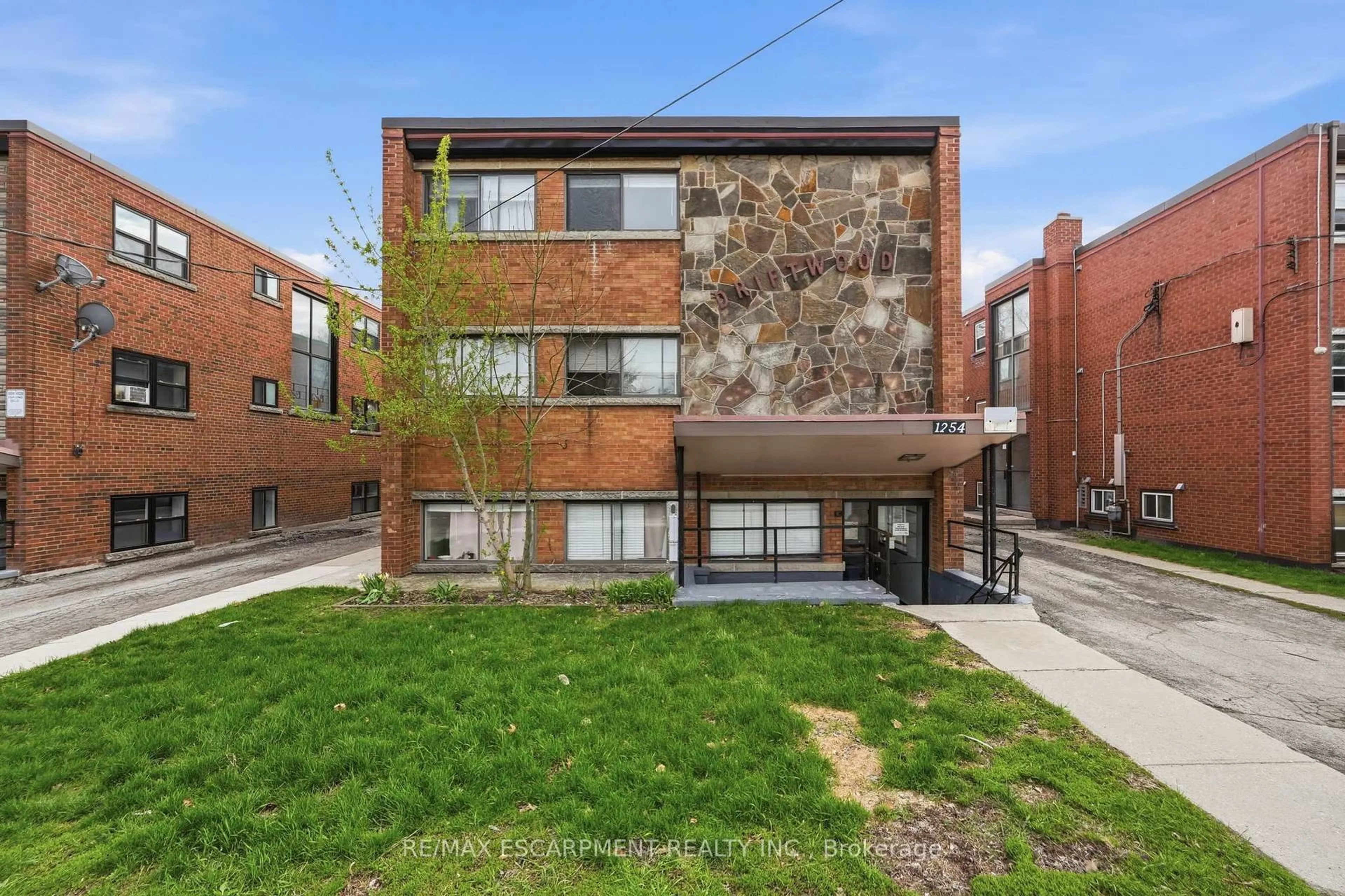 Home with brick exterior material, street for 1254 Fennell Ave, Hamilton Ontario L8T 1T4