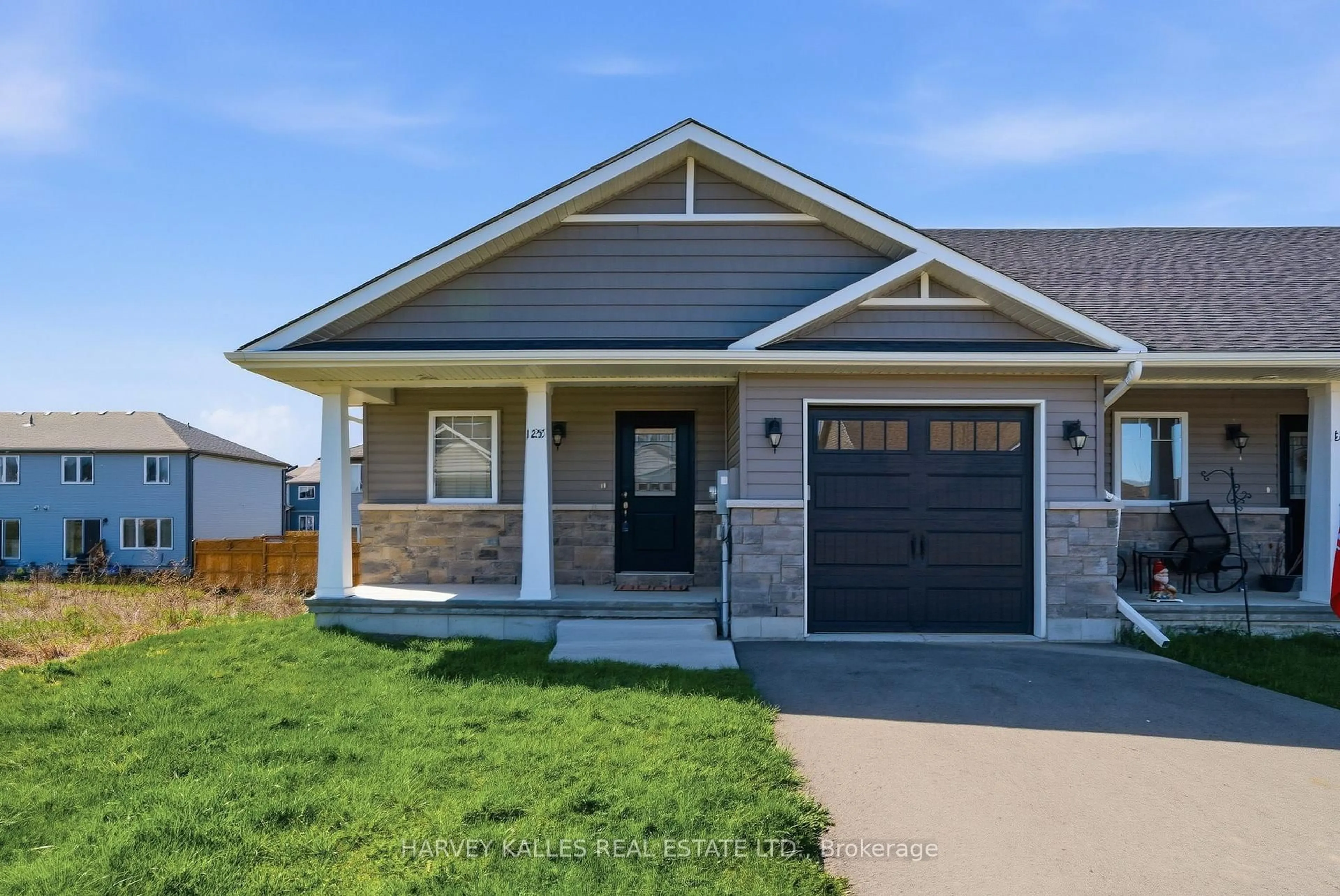 Home with vinyl exterior material, street for 125 Farrington Cres, Prince Edward County Ontario K0K 2T0