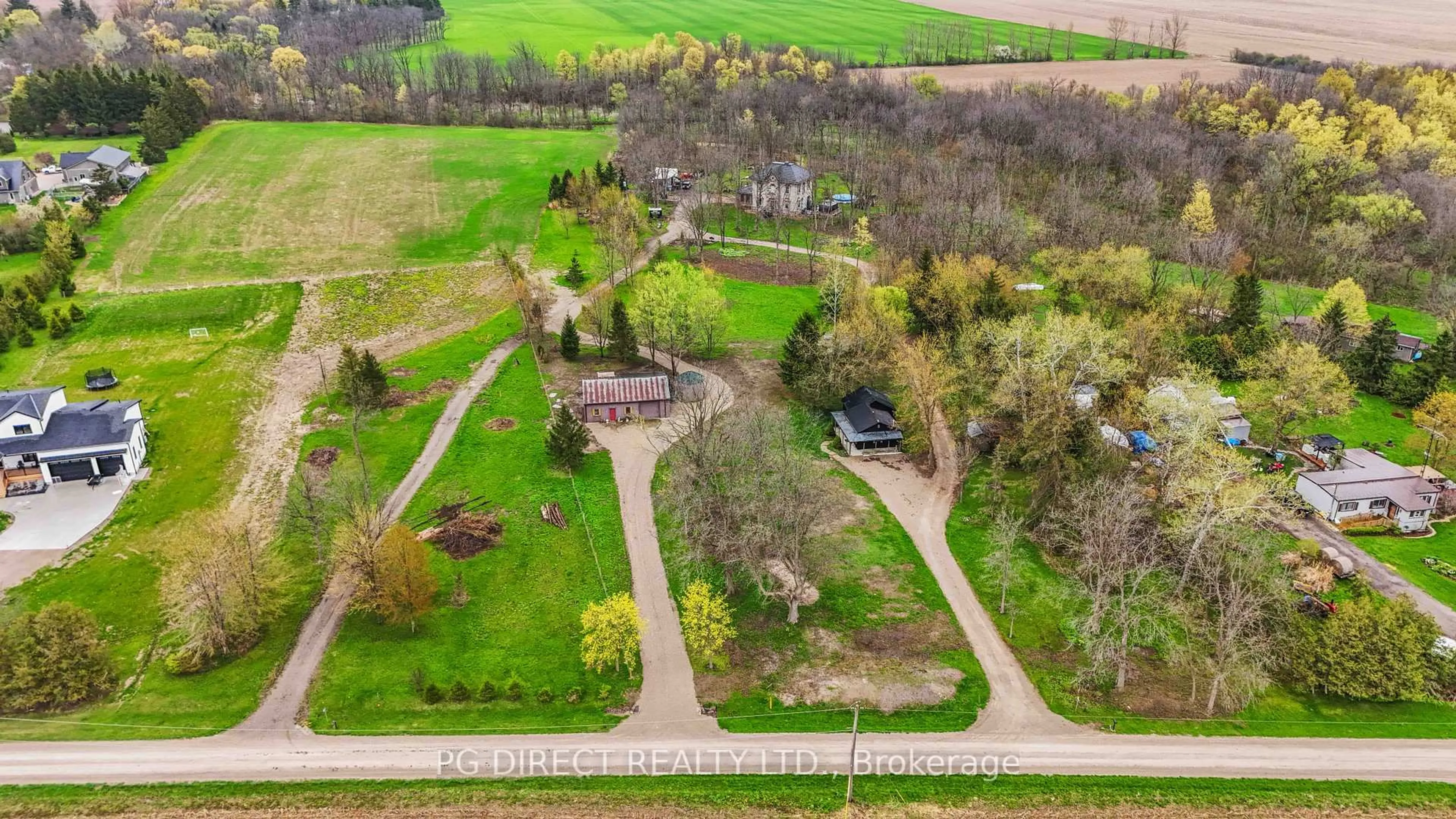 A pic from outside/outdoor area/front of a property/back of a property/a pic from drone, street for 12096 Gale Rd, North Middlesex Ontario N0M 1A0