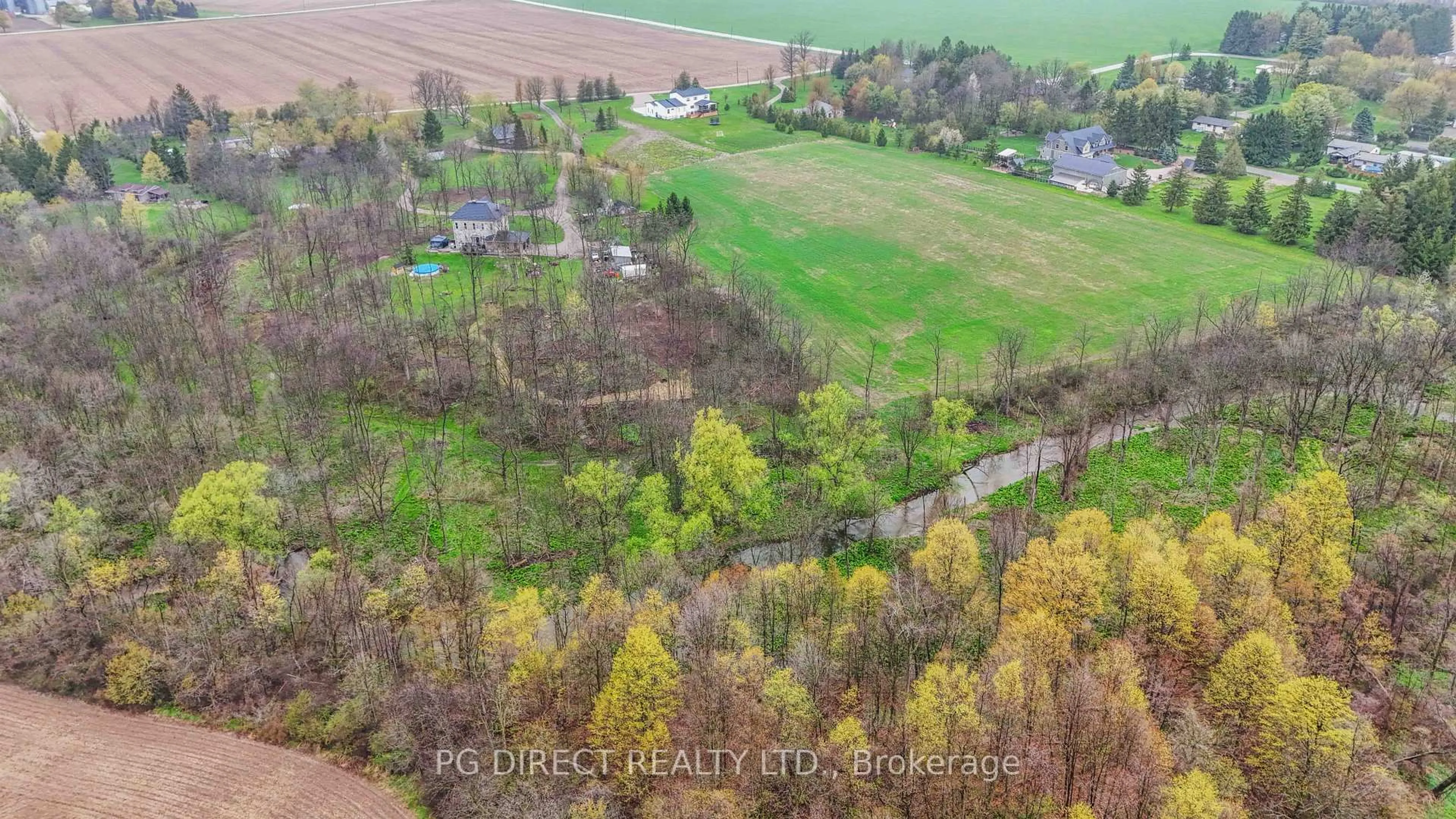 A pic from outside/outdoor area/front of a property/back of a property/a pic from drone, forest/trees view for 12096 Gale Rd, North Middlesex Ontario N0M 1A0