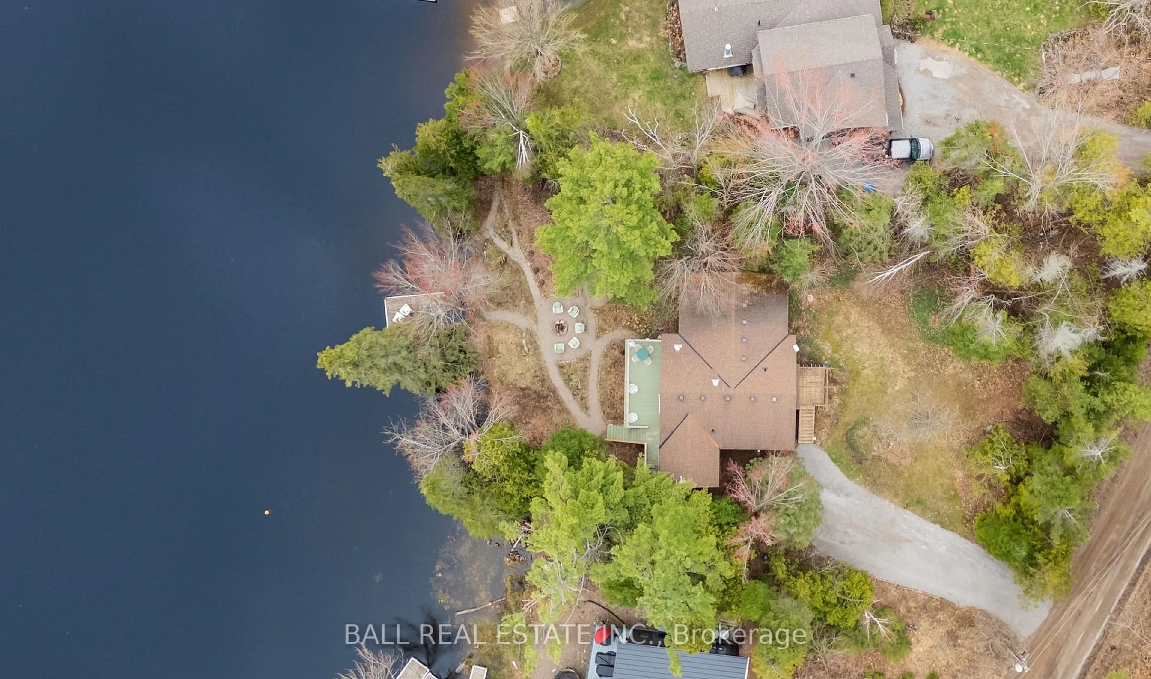 A pic from outside/outdoor area/front of a property/back of a property/a pic from drone, water/lake/river/ocean view for 26 Cedar Crt, Trent Lakes Ontario K0M 1A0