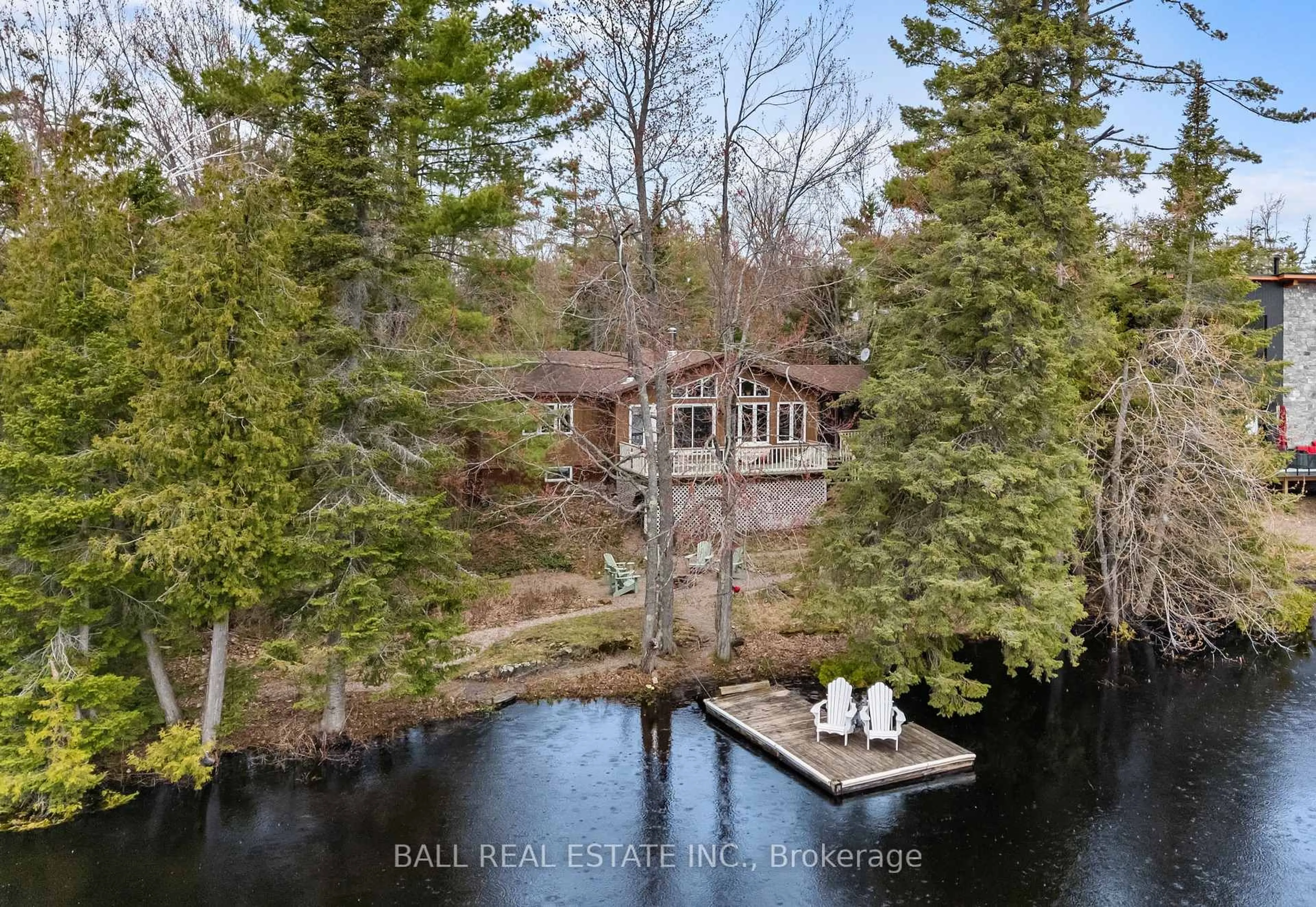 A pic from outside/outdoor area/front of a property/back of a property/a pic from drone, water/lake/river/ocean view for 26 Cedar Crt, Trent Lakes Ontario K0M 1A0