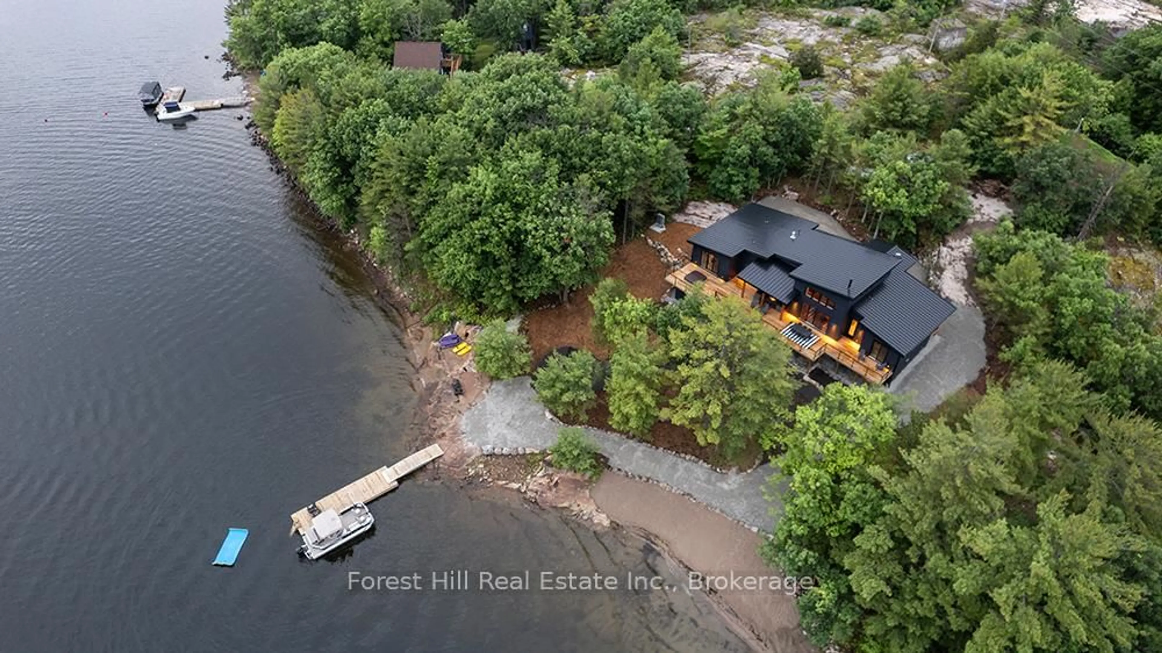 A pic from outside/outdoor area/front of a property/back of a property/a pic from drone, water/lake/river/ocean view for 40 Island 810, Georgian Bay Ontario P0E 1E0
