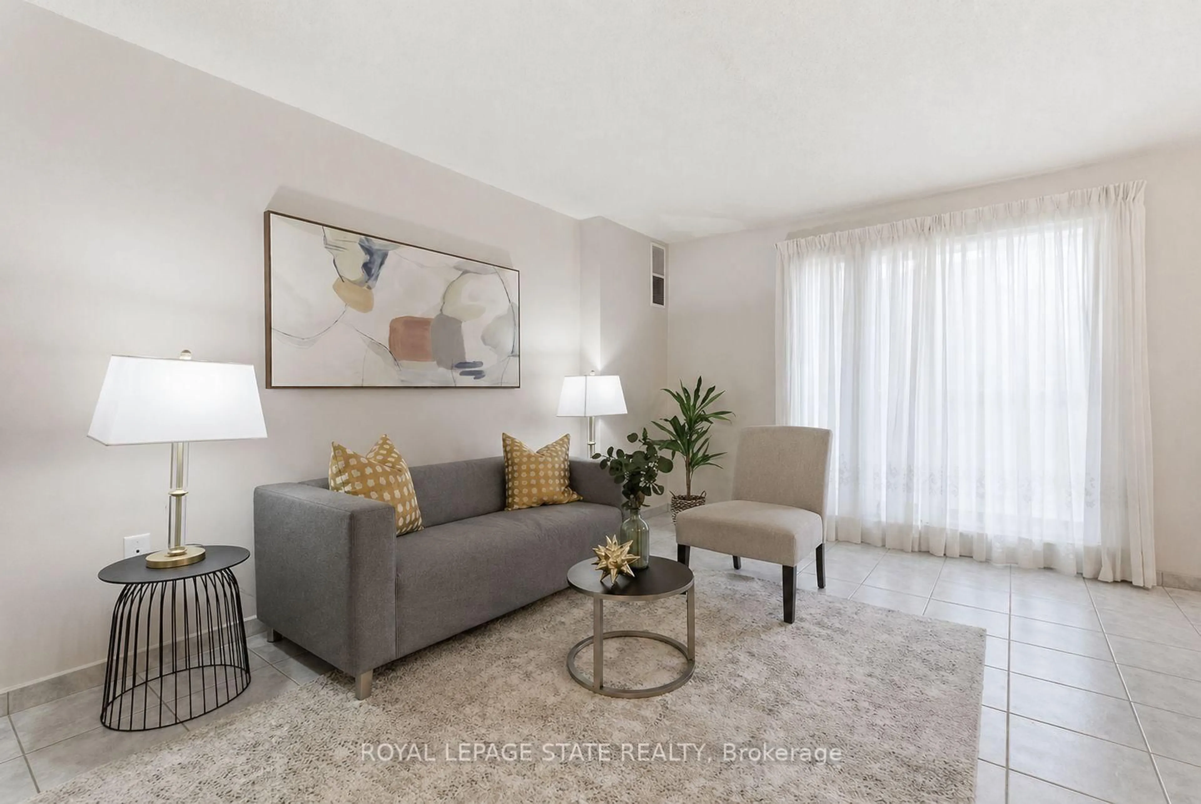 Living room with furniture, unknown for 966 Queenston Rd #302, Hamilton Ontario L8G 1B7