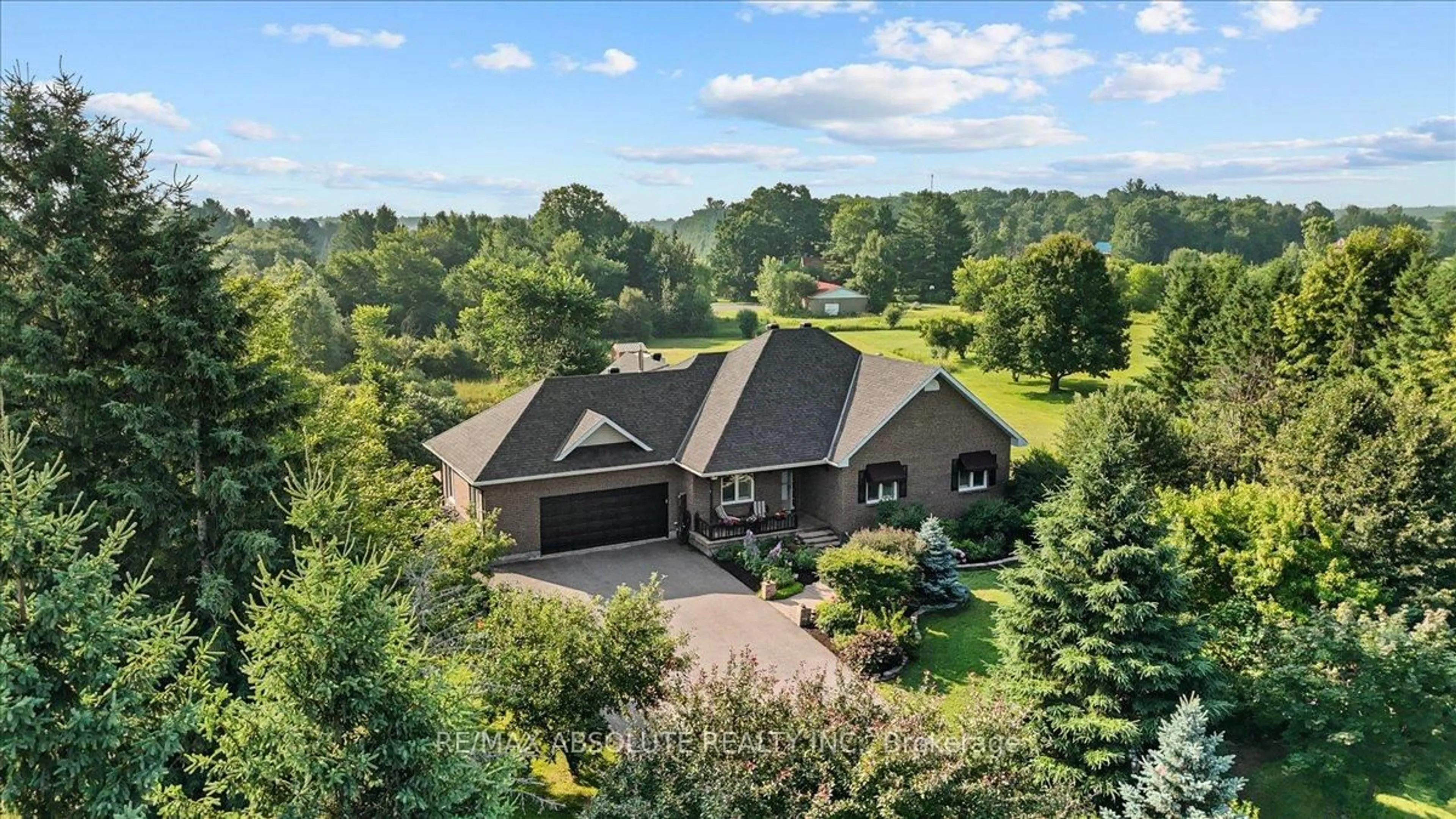 A pic from outside/outdoor area/front of a property/back of a property/a pic from drone, water/lake/river/ocean view for 1801 Rocklane Dr, Kanata Ontario K2W 1B5