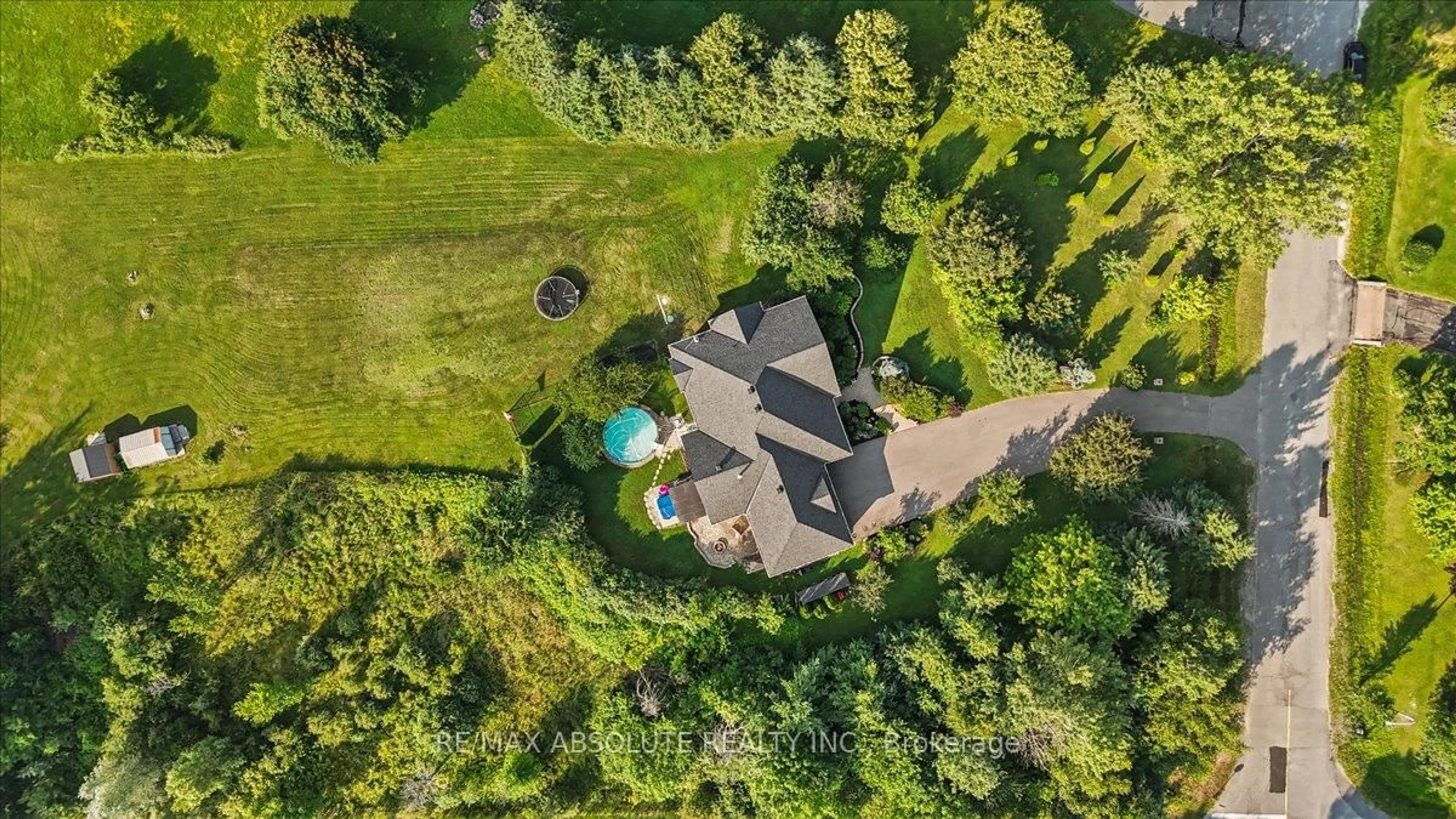 A pic from outside/outdoor area/front of a property/back of a property/a pic from drone, unknown for 1801 Rocklane Dr, Kanata Ontario K2W 1B5