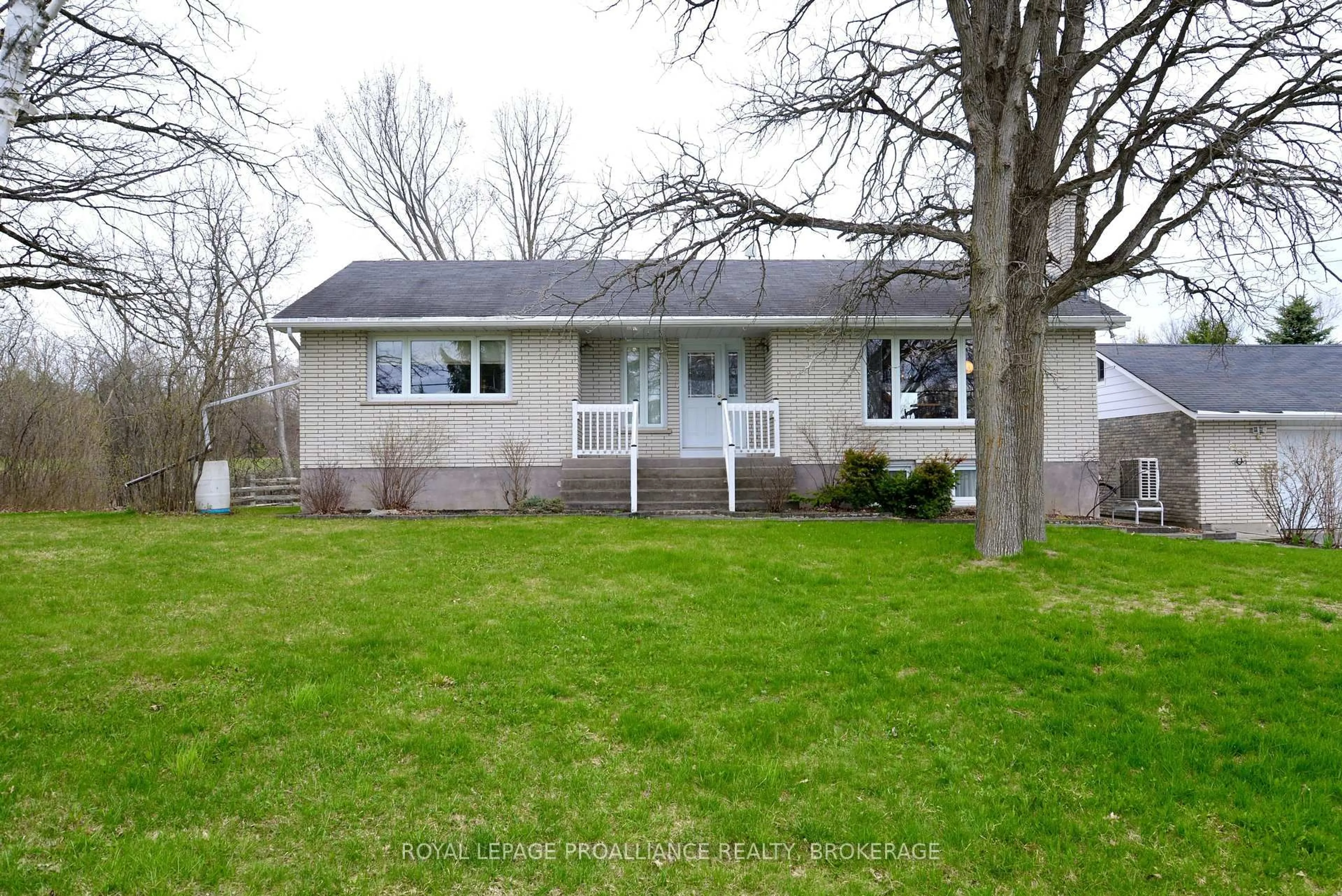 Home with vinyl exterior material, street for 2489 Leeman Rd, Mcdonalds Corners Ontario K0H 1M0