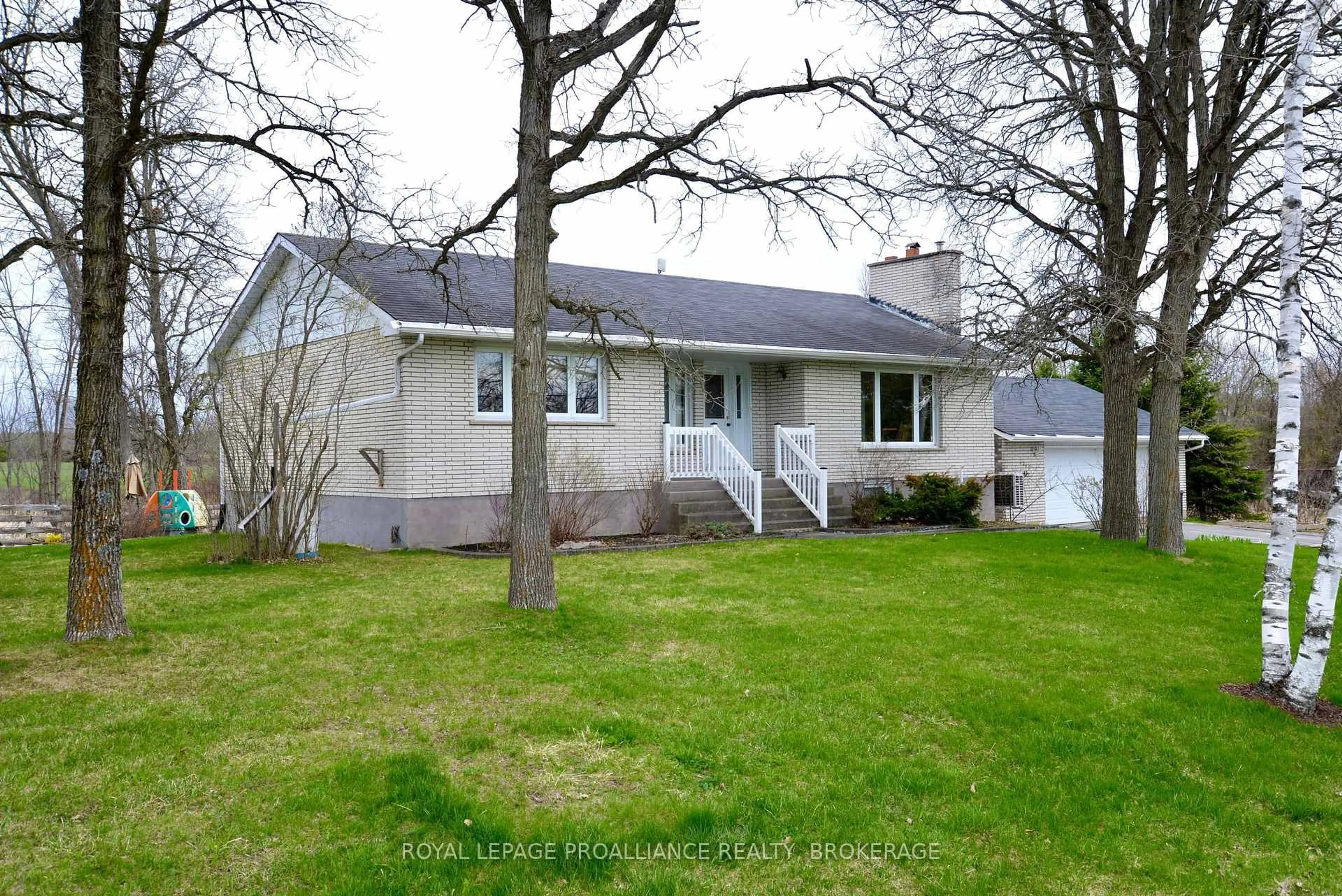 Home with vinyl exterior material, street for 2489 Leeman Rd, Mcdonalds Corners Ontario K0H 1M0