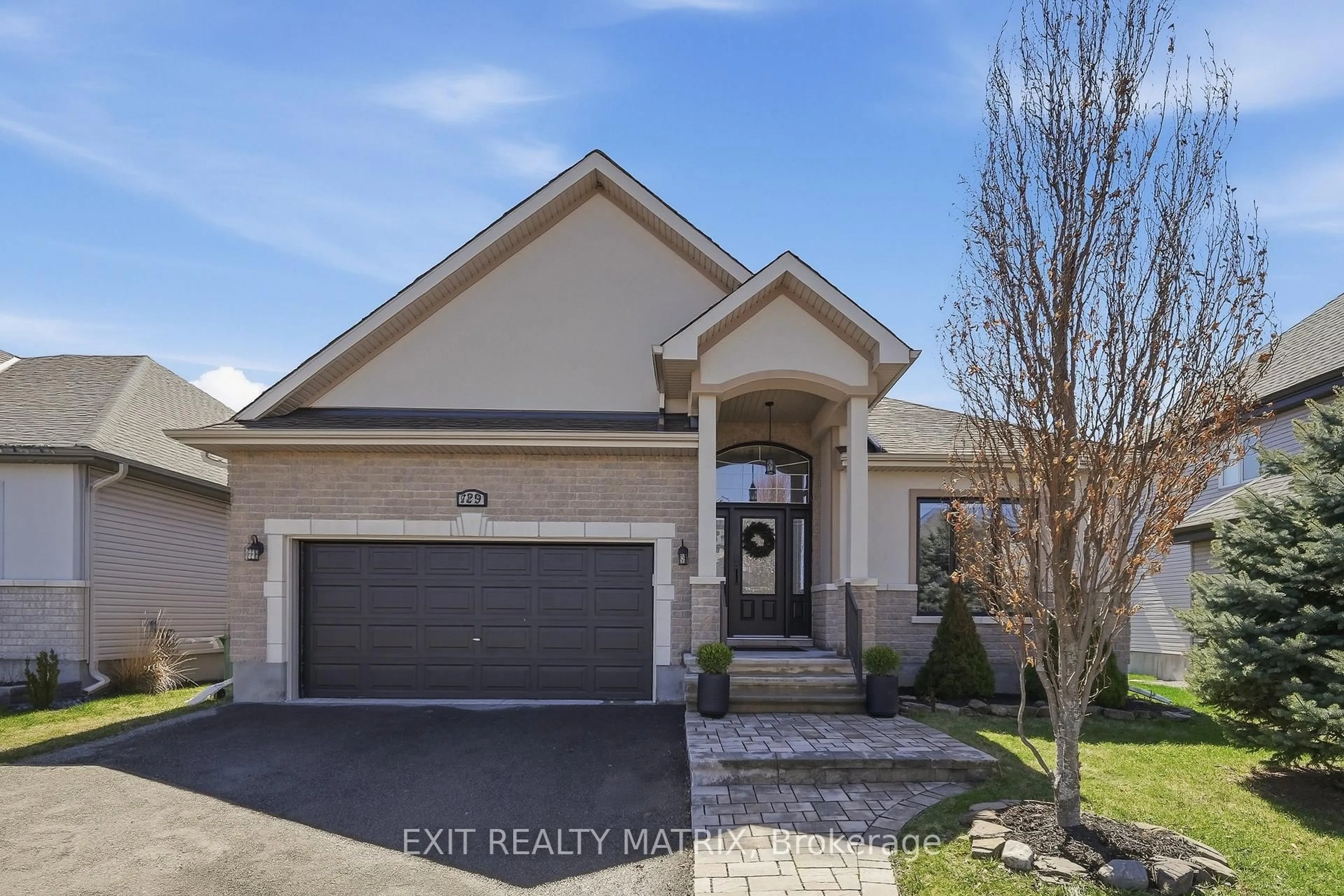 Home with brick exterior material, street for 129 Abbey Cres, Russell Ontario K4R 1A1