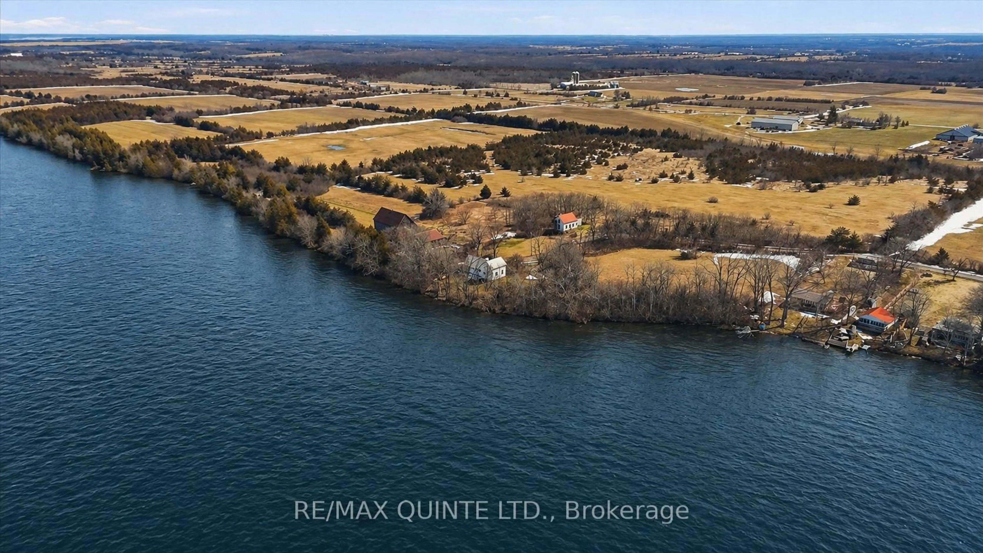 A pic from outside/outdoor area/front of a property/back of a property/a pic from drone, water/lake/river/ocean view for 115 Gibson Rd, Prince Edward County Ontario K0K 1A0