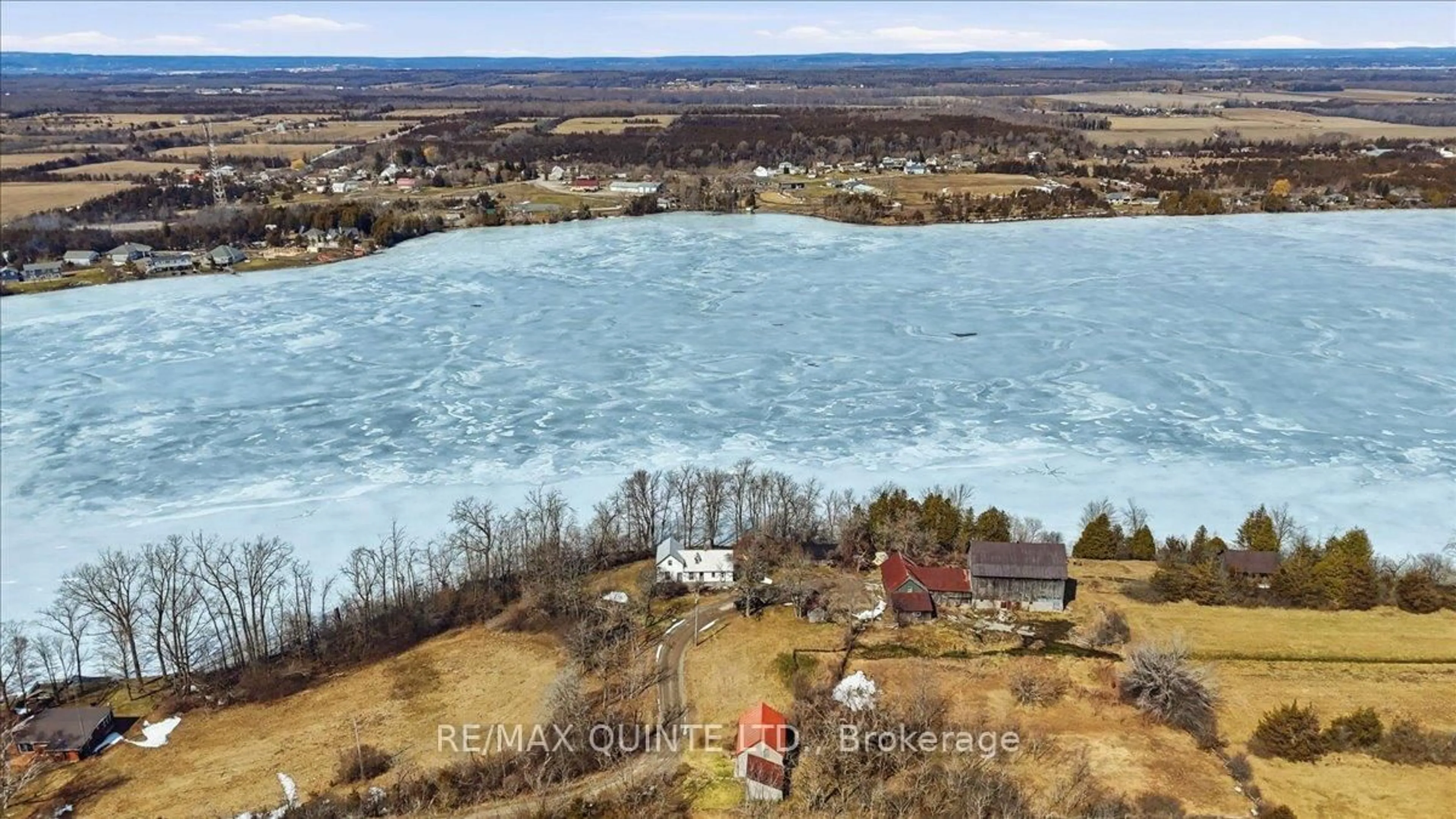 A pic from outside/outdoor area/front of a property/back of a property/a pic from drone, water/lake/river/ocean view for 115 Gibson Rd, Prince Edward County Ontario K0K 1A0