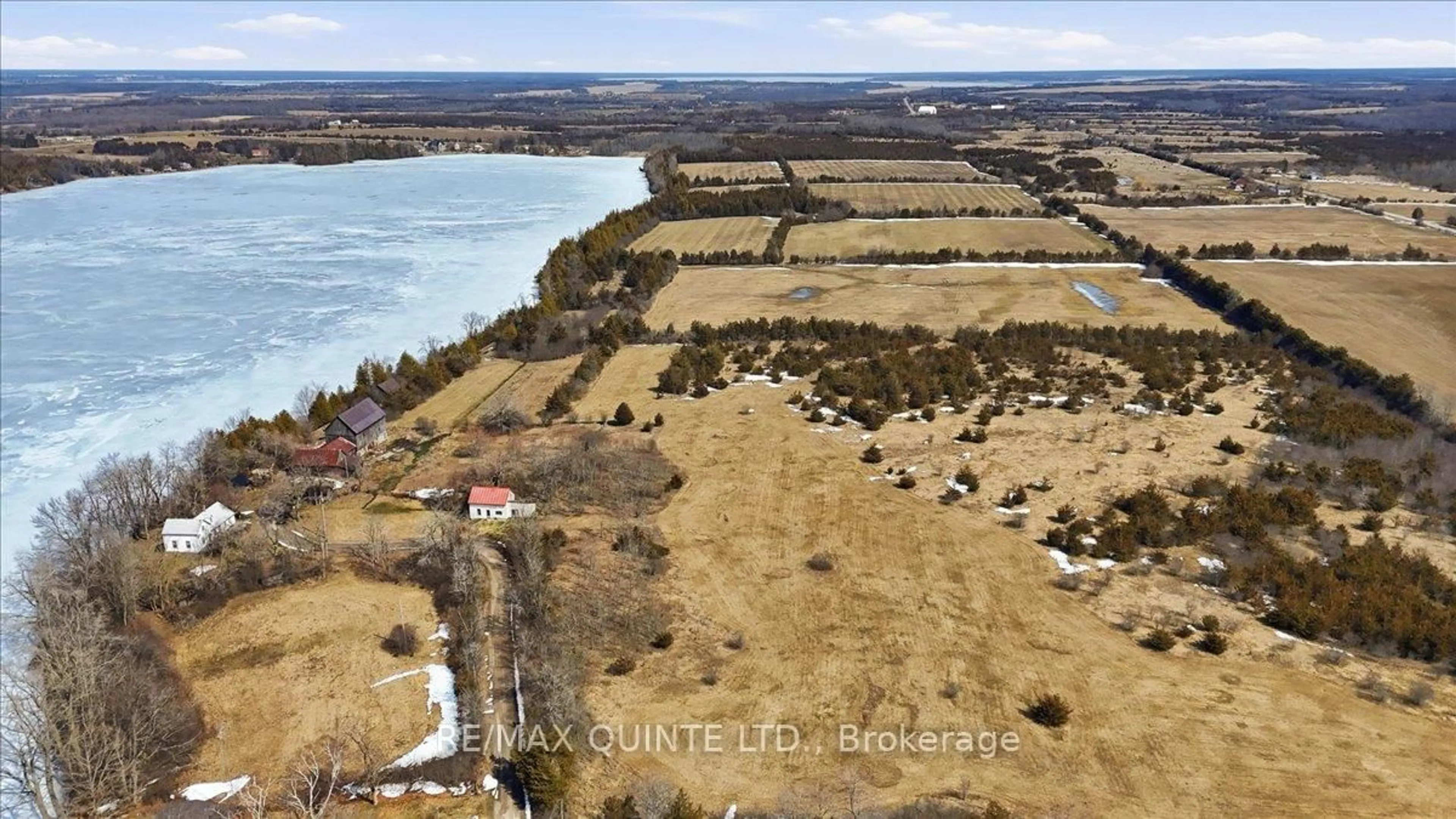 A pic from outside/outdoor area/front of a property/back of a property/a pic from drone, water/lake/river/ocean view for 115 Gibson Rd, Prince Edward County Ontario K0K 1A0