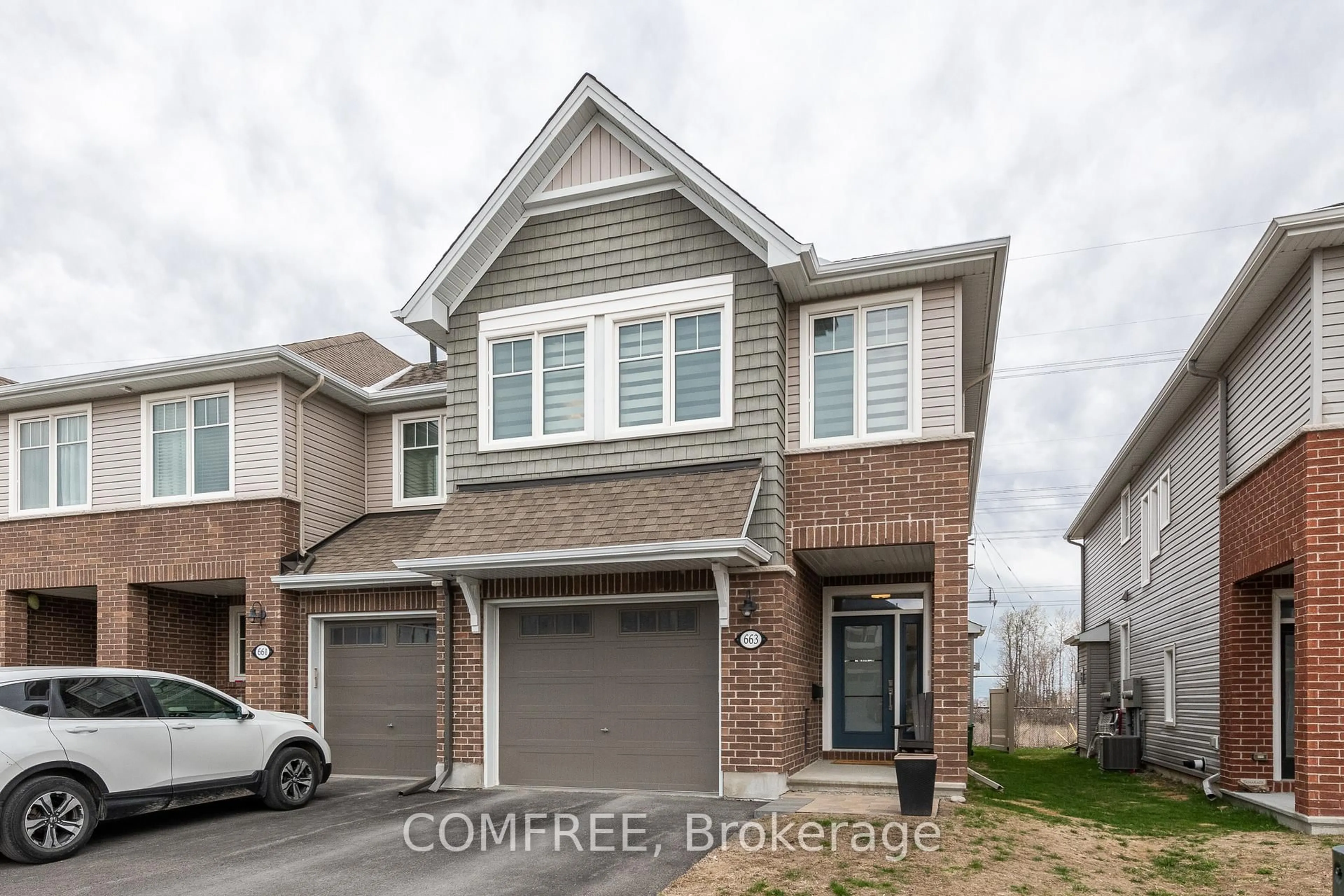 Home with brick exterior material, street for 663 Putney Cres, Ottawa Ontario K2S 2N7