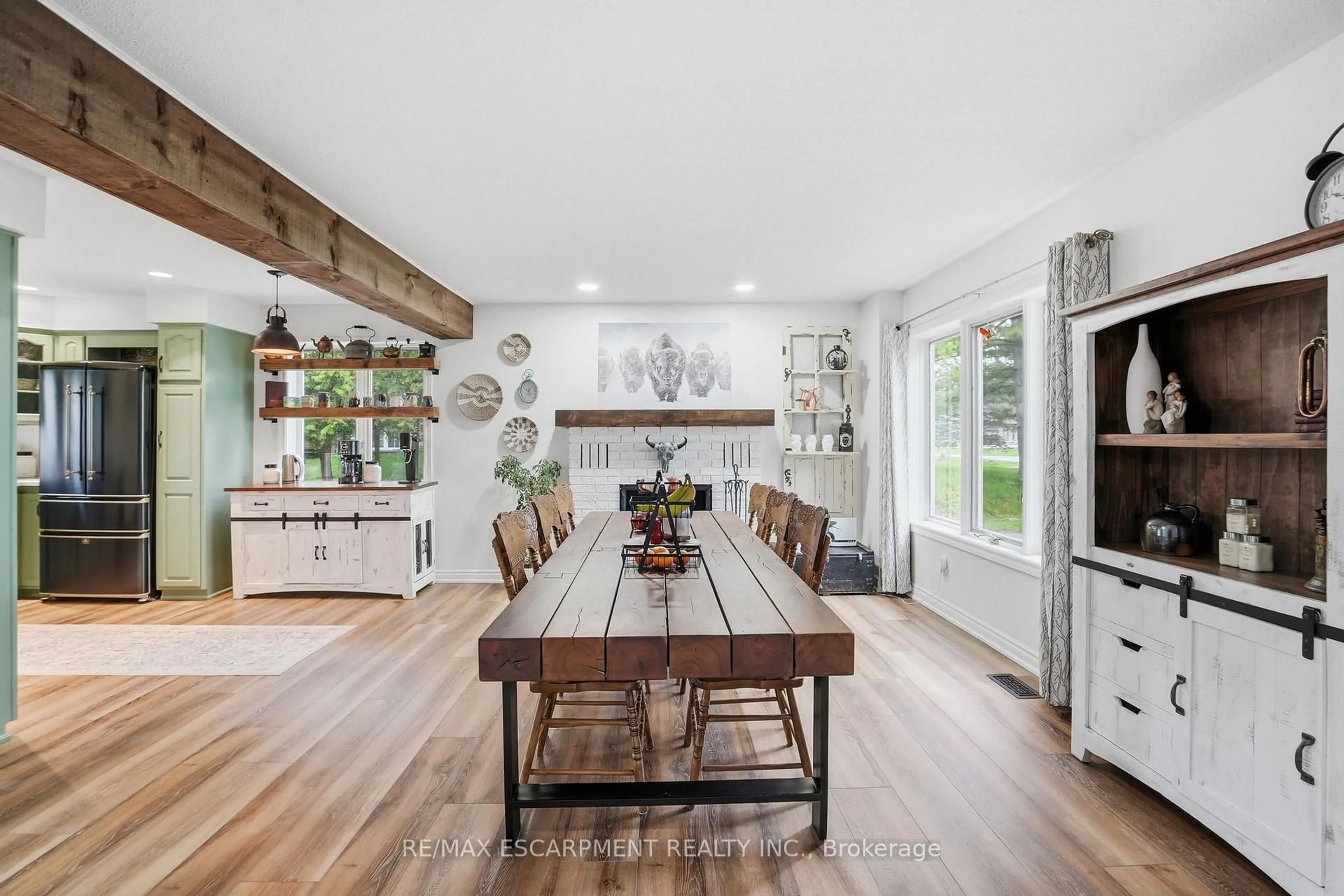 Open concept kitchen, wood/laminate floor for 27 Blossom Ave, Brantford Ontario N3T 5L9