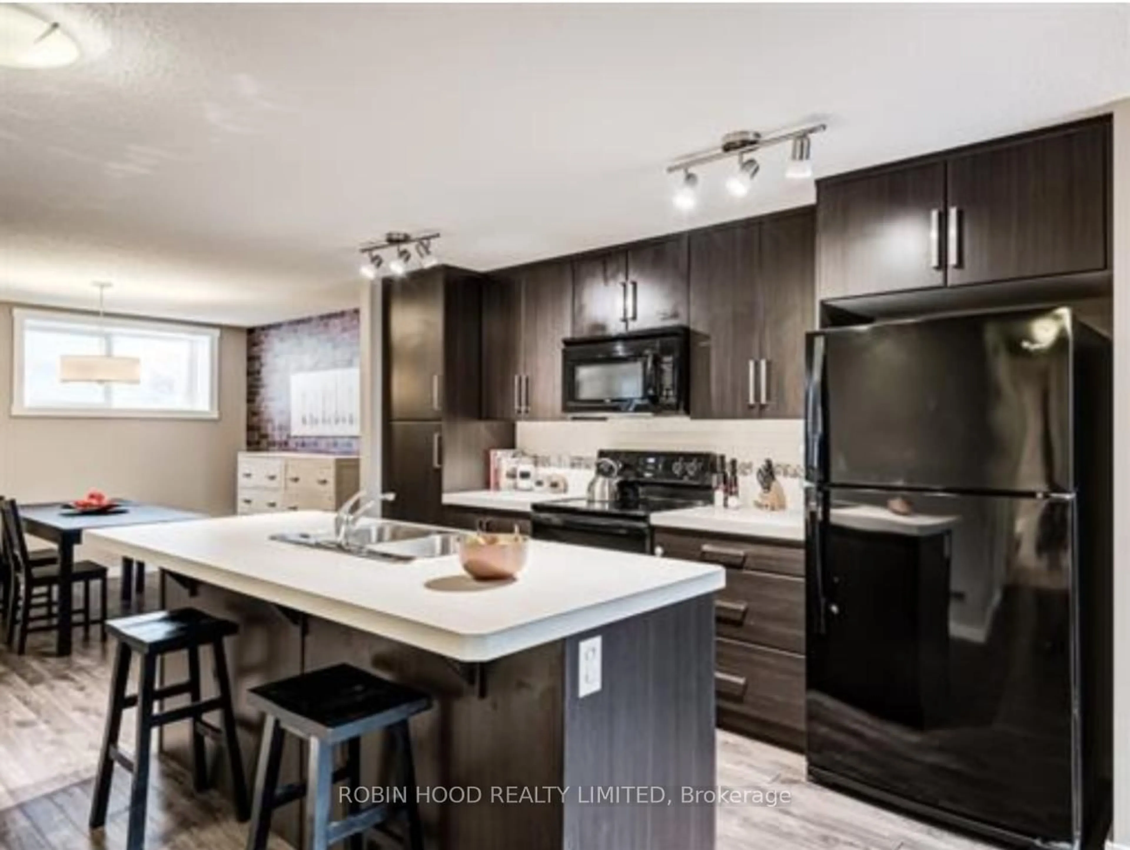 Open concept kitchen, unknown for 517 McKenzie Towne Clse #100, Out of Area Alberta T2Z 1A8