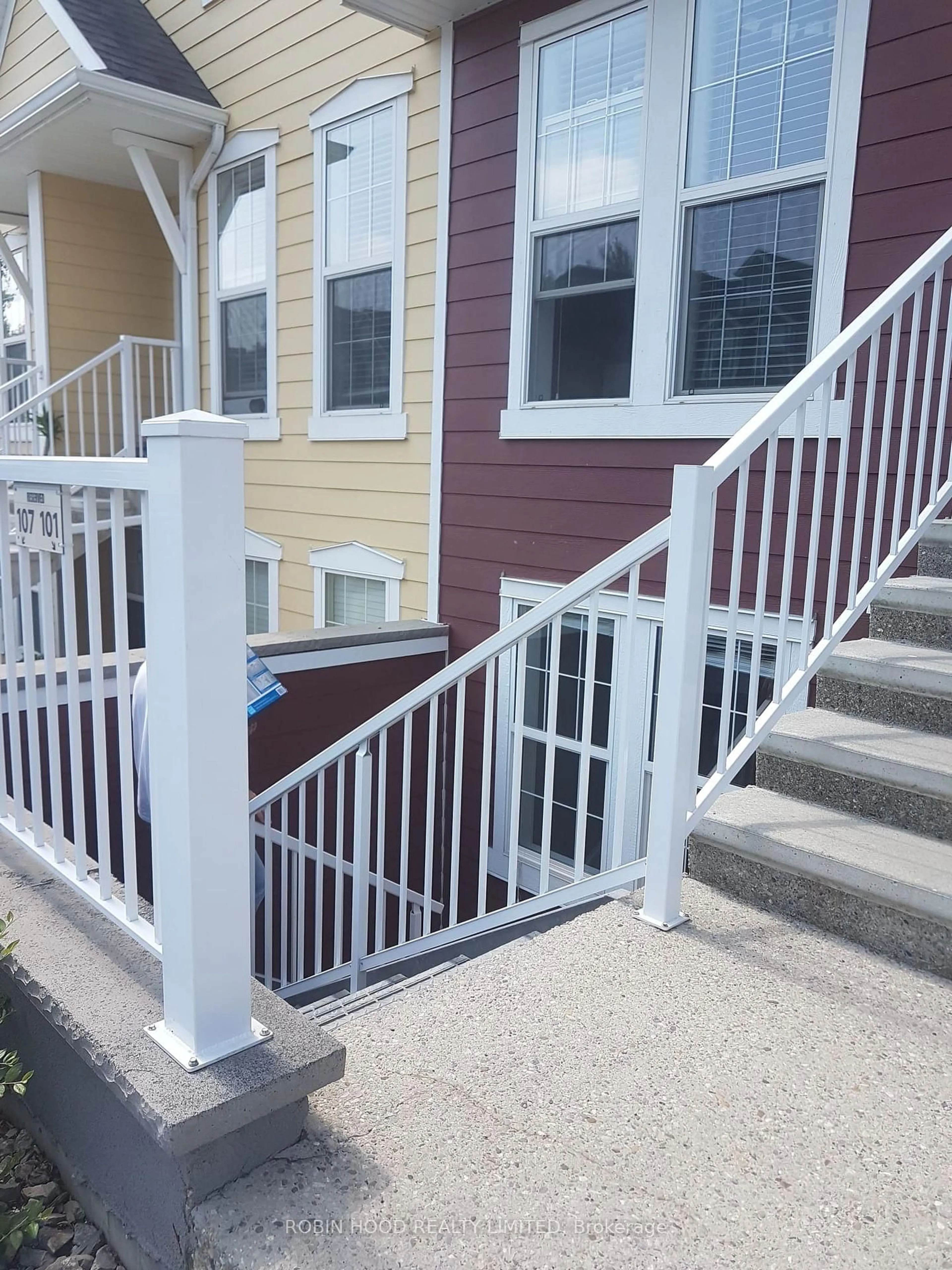 Home with vinyl exterior material, street for 517 McKenzie Towne Clse #100, Out of Area Alberta T2Z 1A8