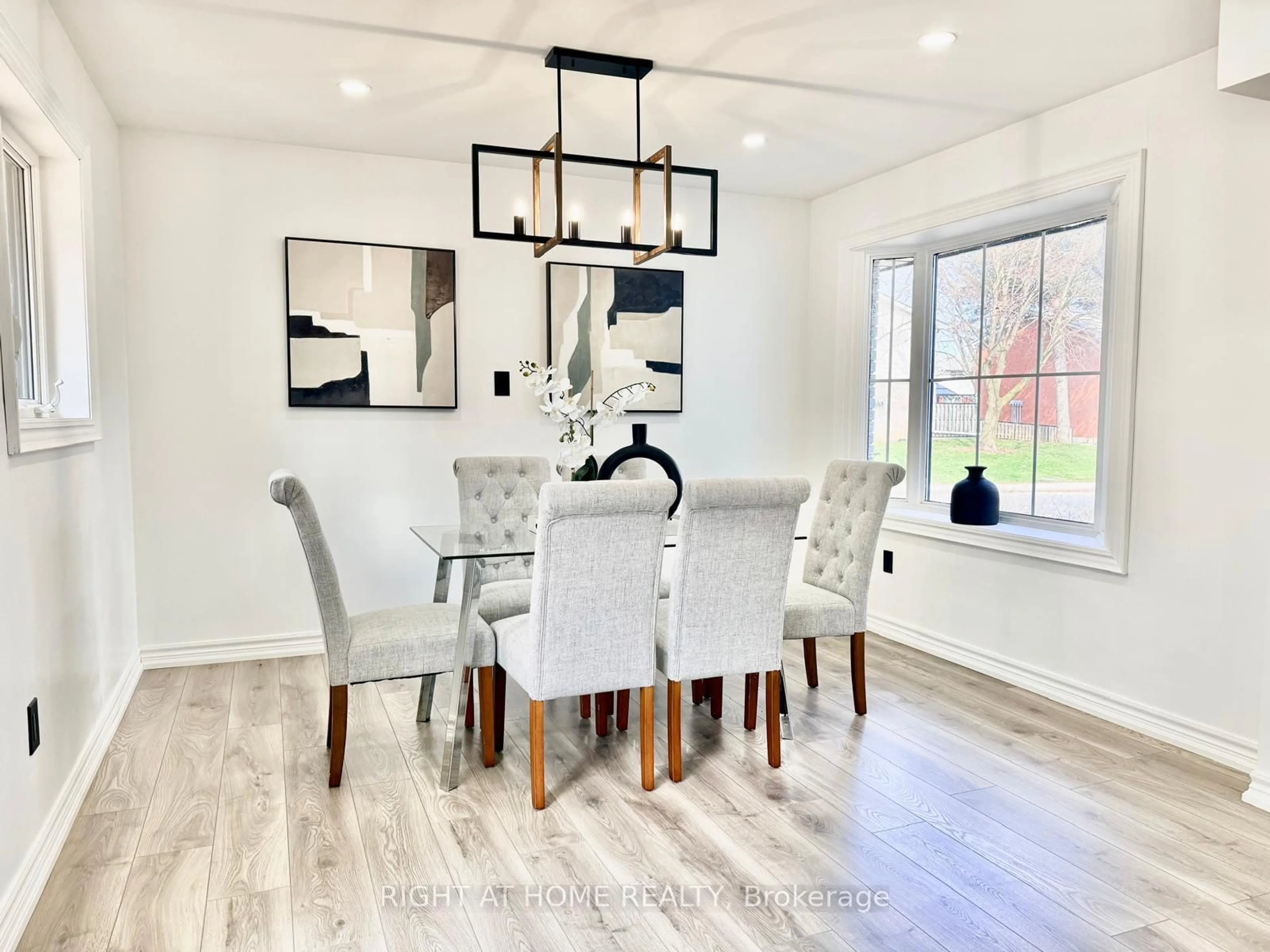 Dining room, wood/laminate floor for 77 Elford Cres, Hamilton Ontario L8K 5K8