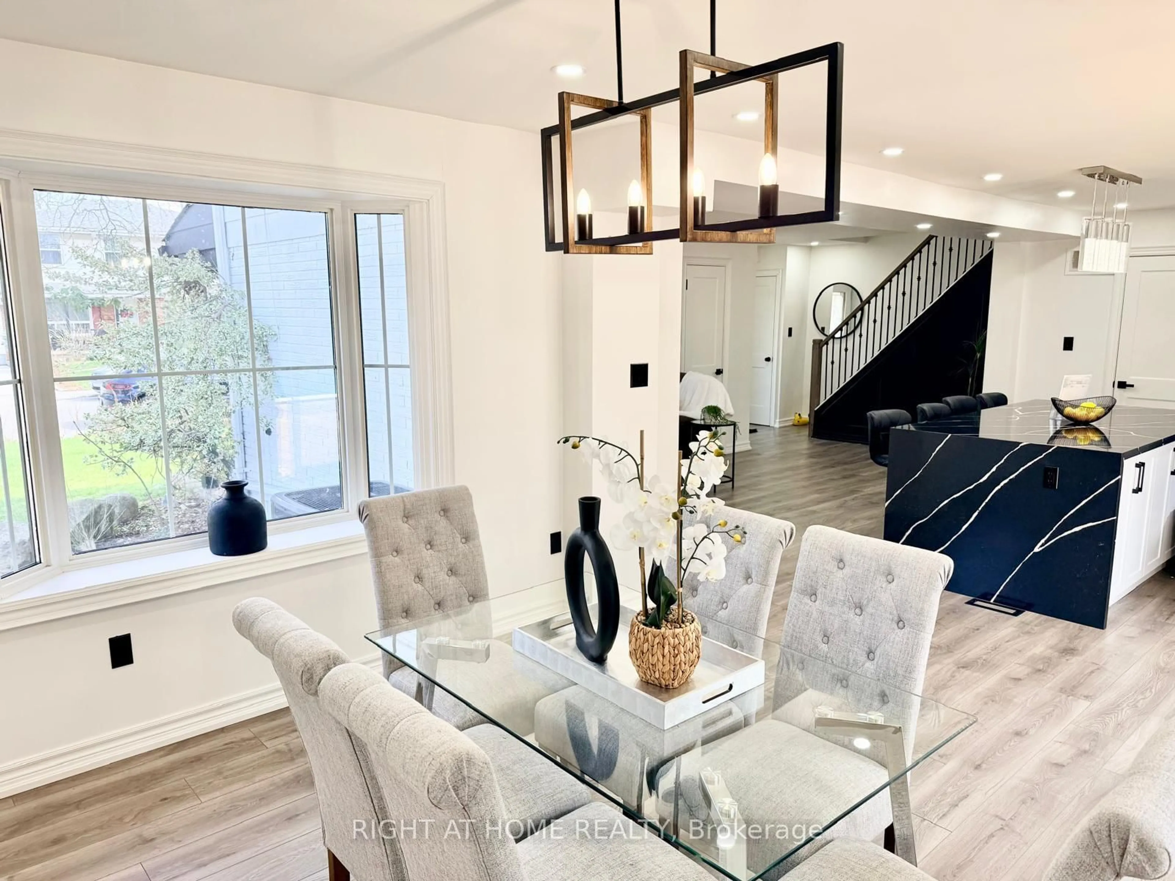 Dining room, wood/laminate floor for 77 Elford Cres, Hamilton Ontario L8K 5K8