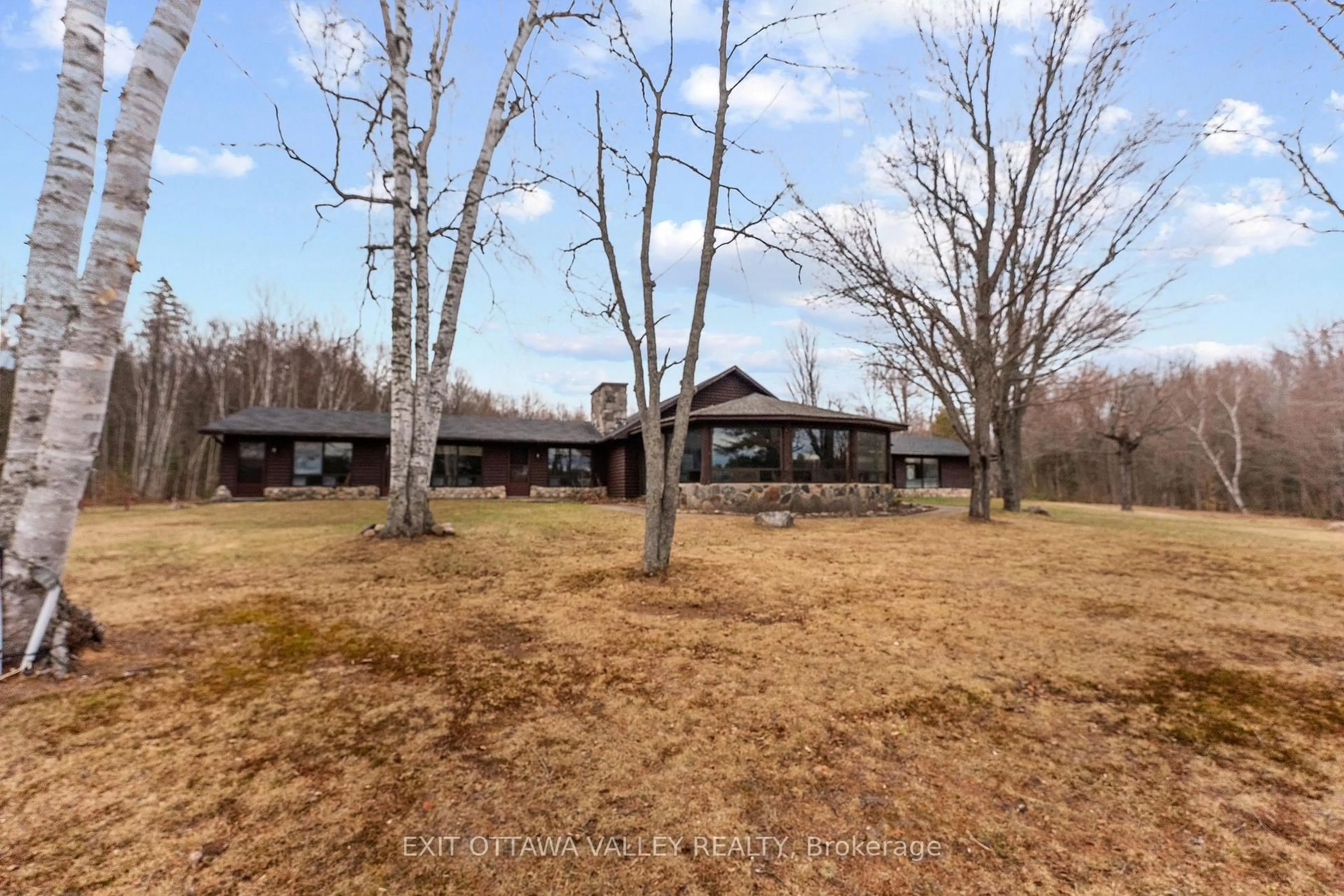 A pic from outside/outdoor area/front of a property/back of a property/a pic from drone, unknown for 104 K/O Lodge Tr, Deep River Ontario K0J 1P0