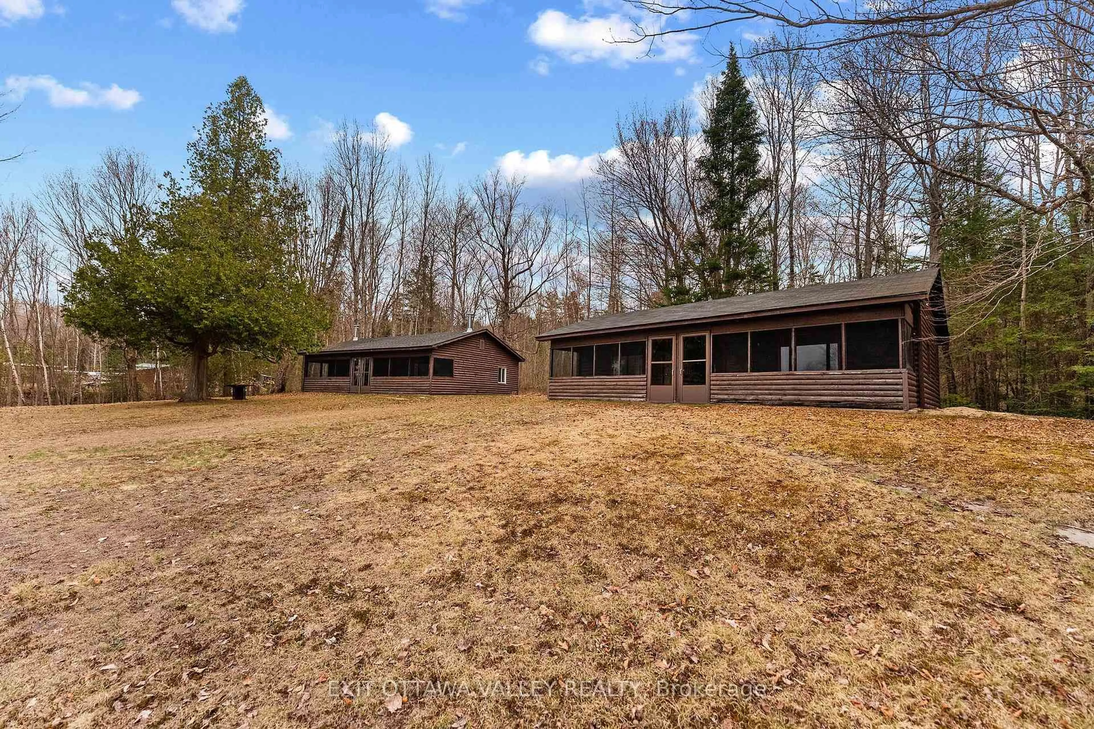 A pic from outside/outdoor area/front of a property/back of a property/a pic from drone, unknown for 104 K/O Lodge Tr, Deep River Ontario K0J 1P0