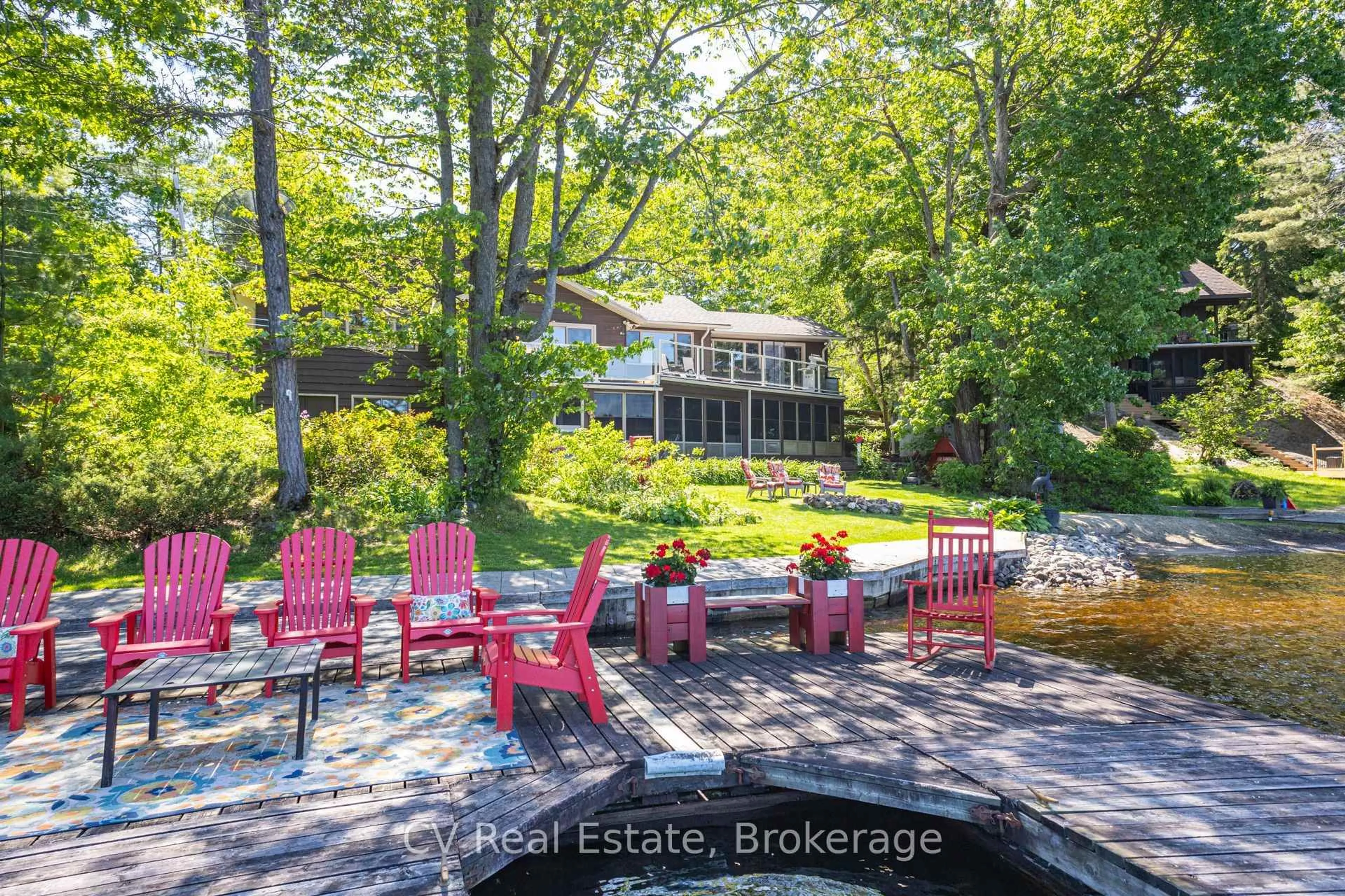 A pic from outside/outdoor area/front of a property/back of a property/a pic from drone, water/lake/river/ocean view for 1240 N Kahshe Lake Rd #Unit #2, Gravenhurst Ontario P0G 1E0