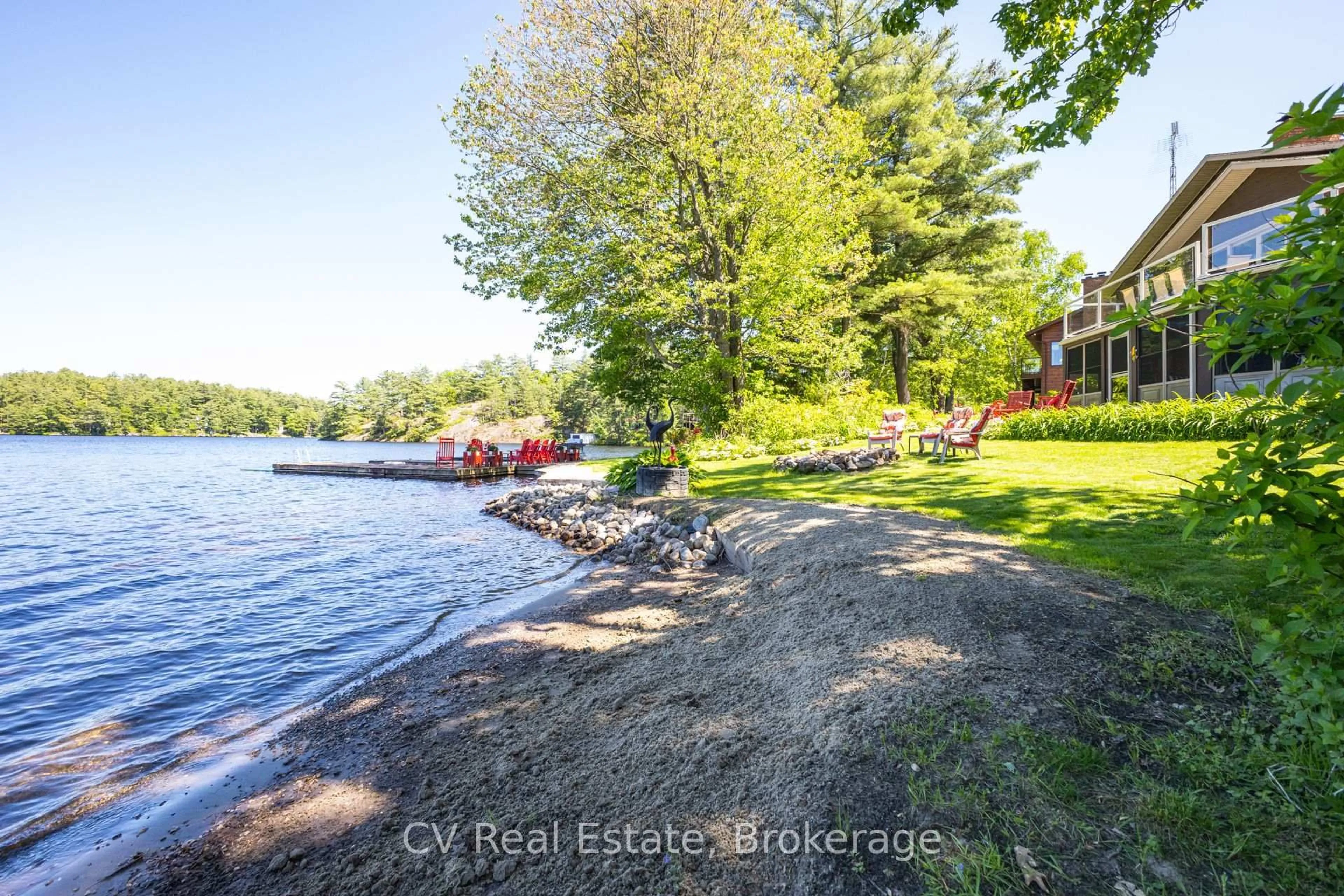 A pic from outside/outdoor area/front of a property/back of a property/a pic from drone, water/lake/river/ocean view for 1240 N Kahshe Lake Rd #Unit #2, Gravenhurst Ontario P0G 1E0