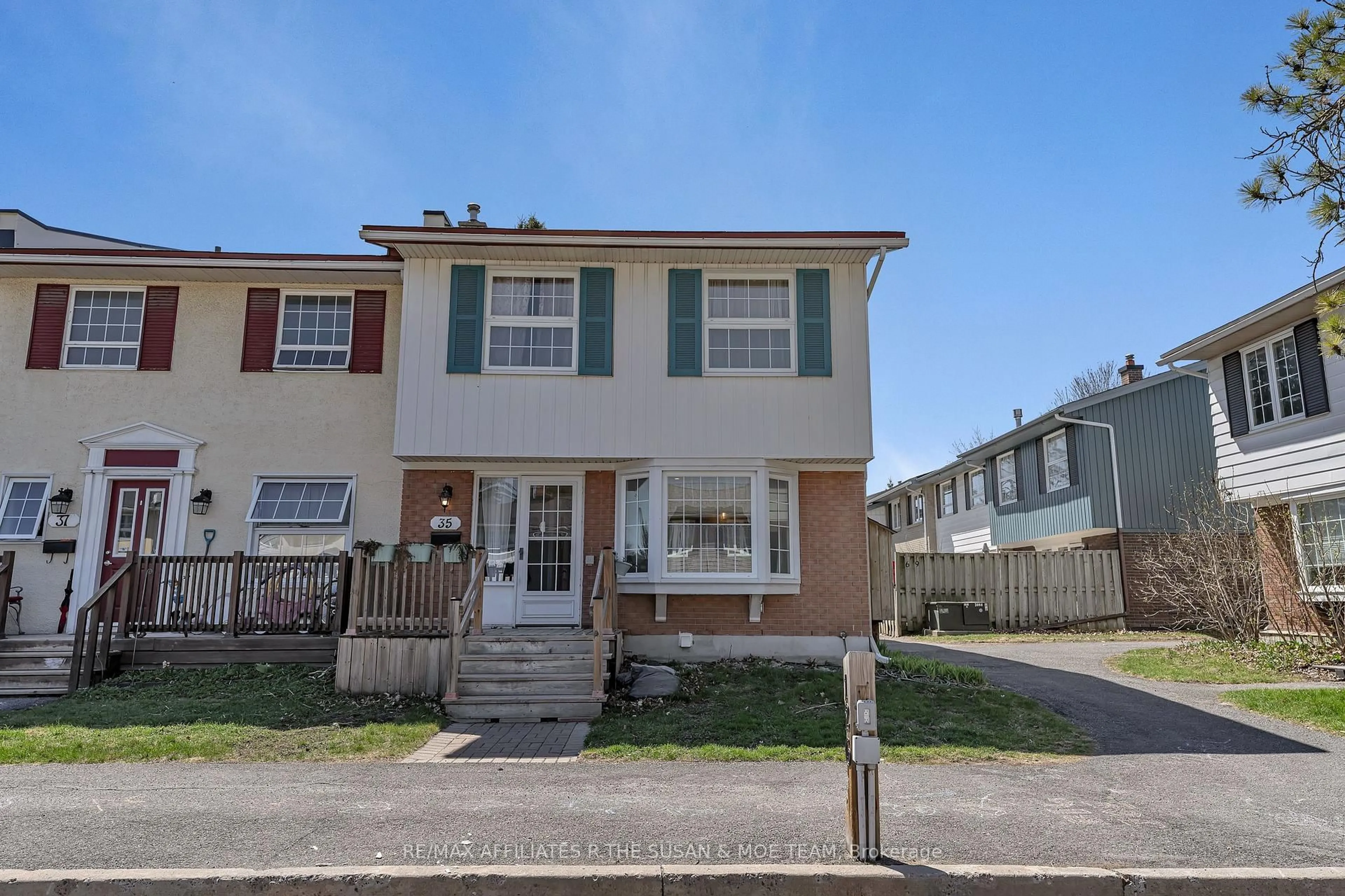 Home with vinyl exterior material, street for 35 Monterey Dr, Ottawa Ontario K2H 7A9