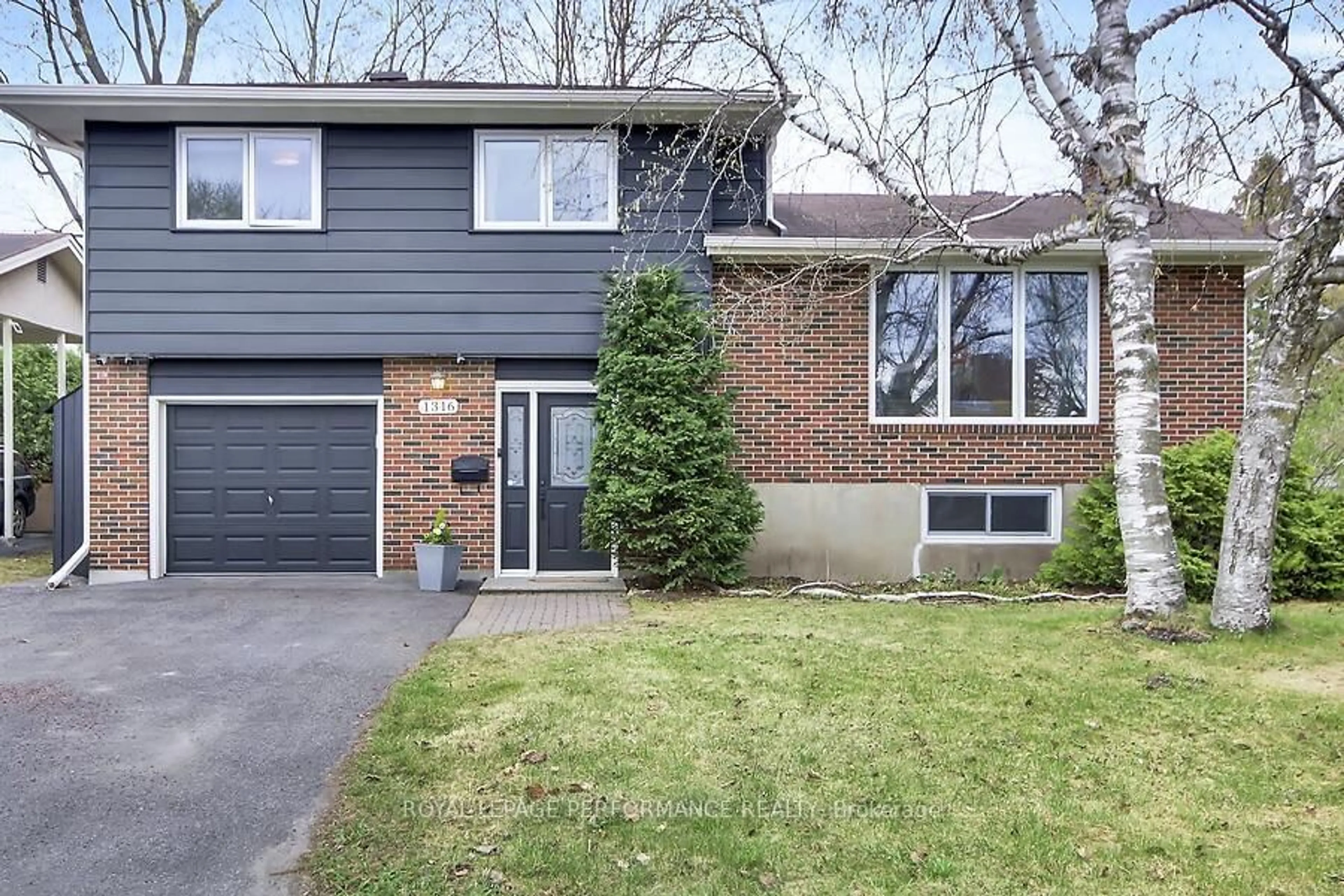 Home with brick exterior material, street for 1316 Paardeburgh Ave, Ottawa Ontario K1V 6V7