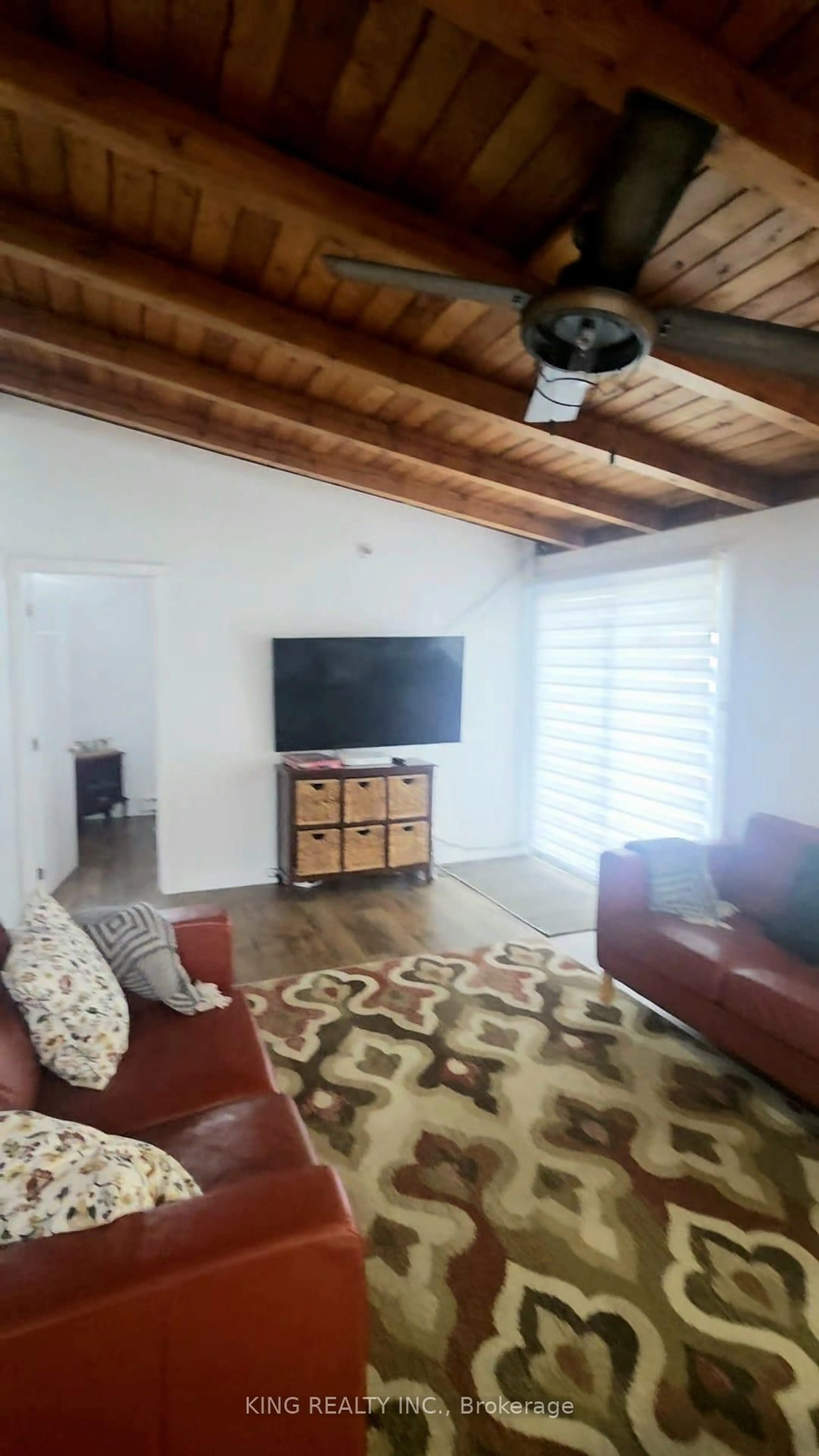 Living room with furniture, wood/laminate floor for 5 Erie Heights Line, Haldimand Ontario N0A 1K0