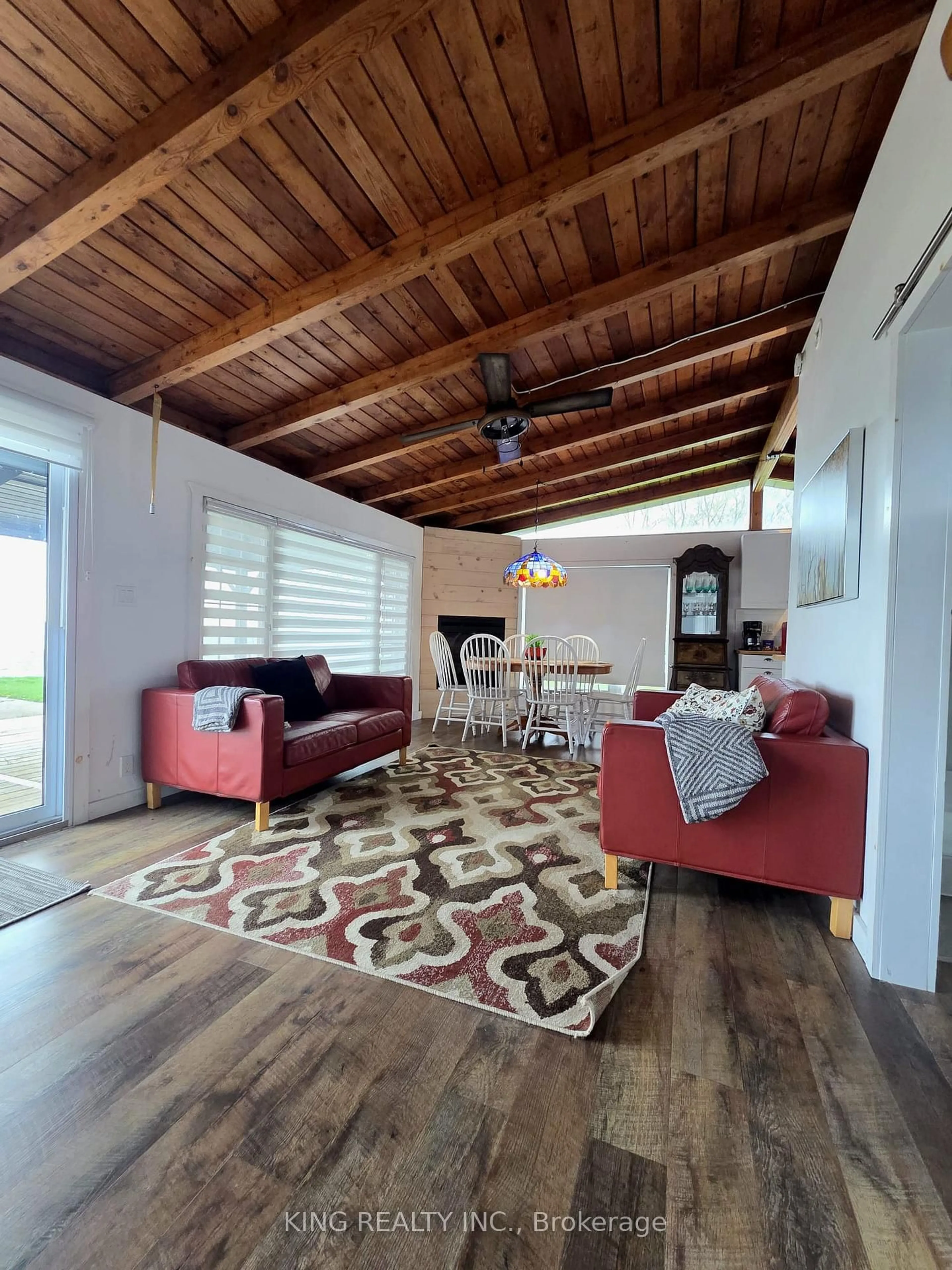 Living room with furniture, wood/laminate floor for 5 Erie Heights Line, Haldimand Ontario N0A 1K0